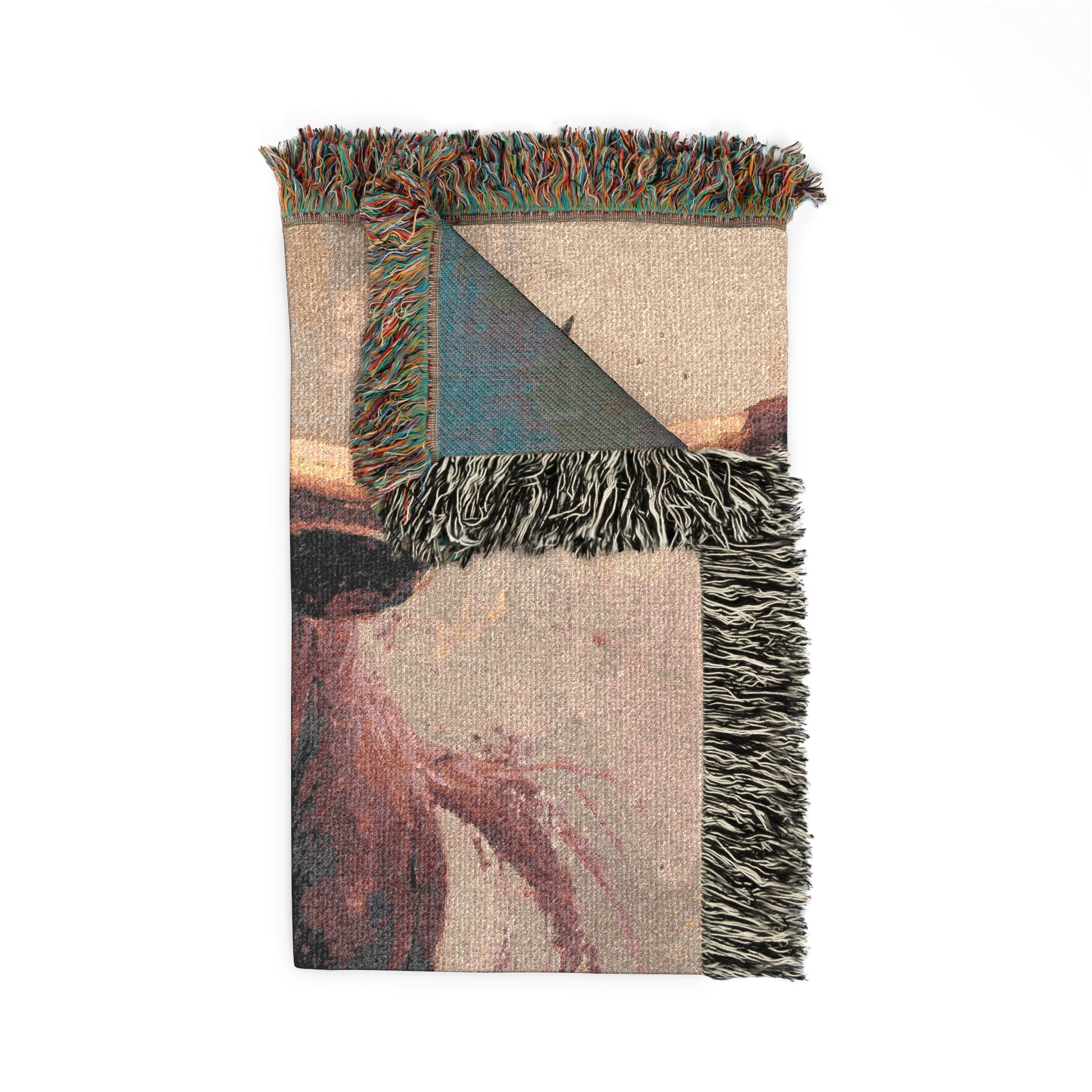 Woven blanket with fringes on a white background