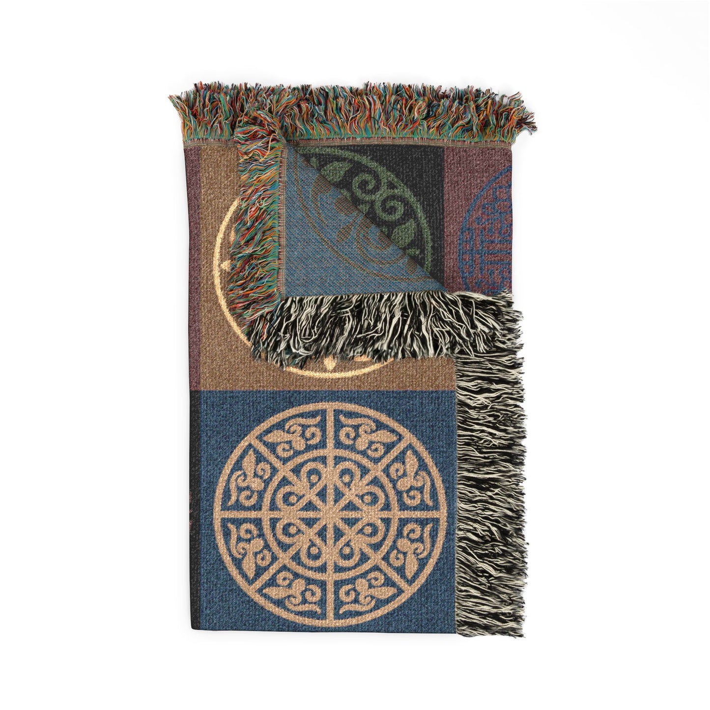 Woven blanket with geometric patterns and fringes on a white background