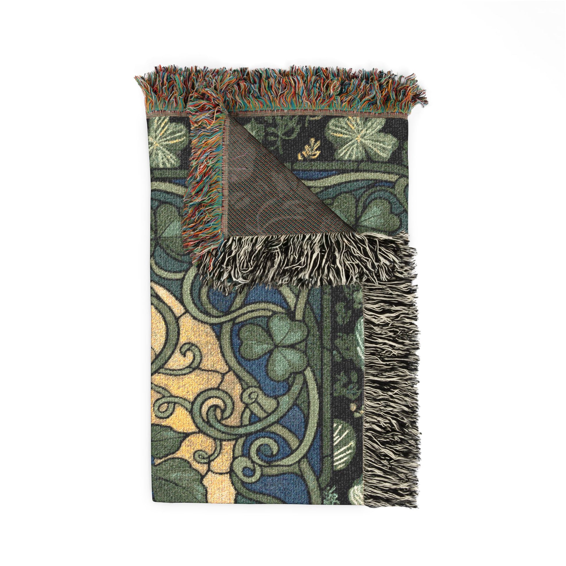 Decorative throw blanket with intricate patterns on a white background