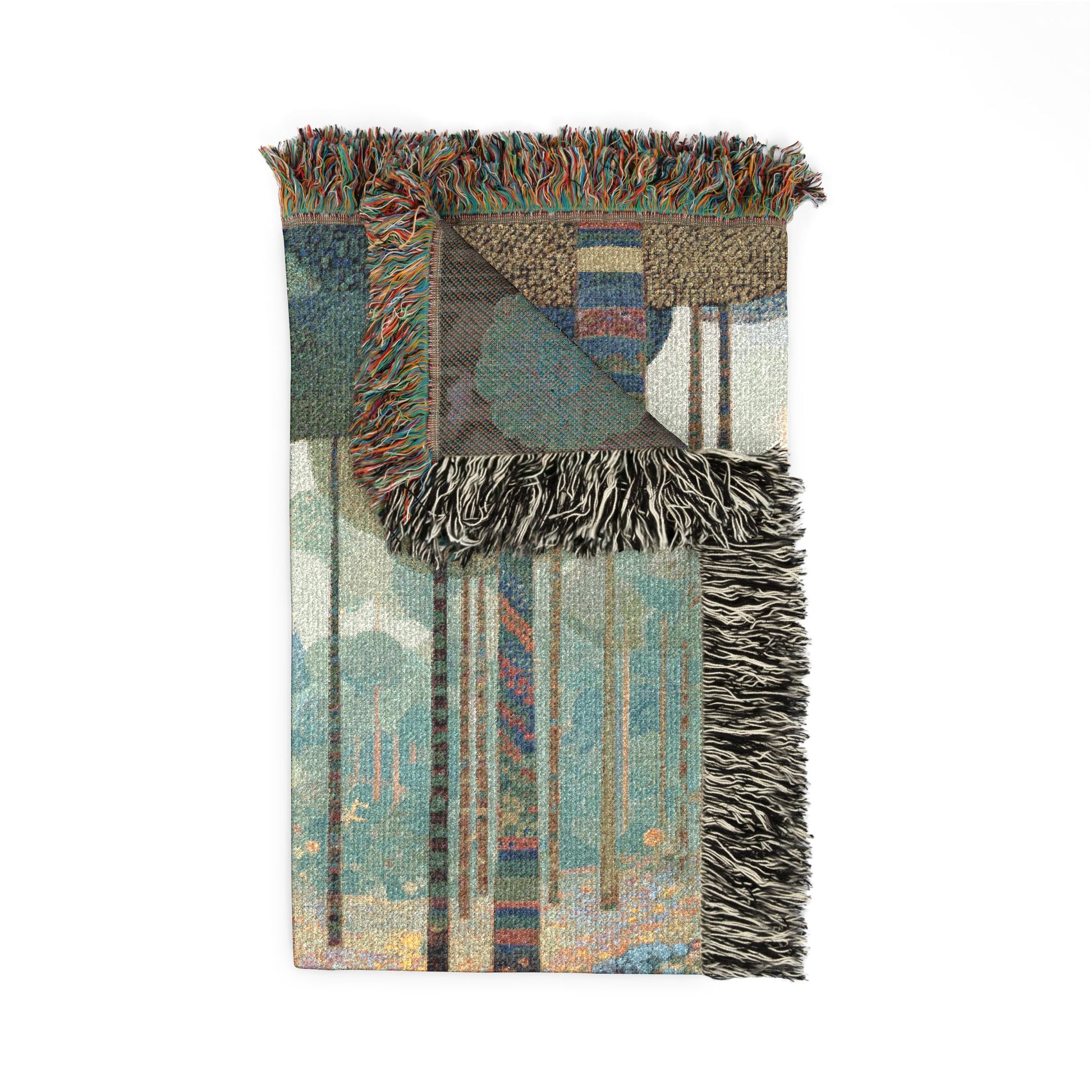 Multicolored woven blanket with fringe on a white background
