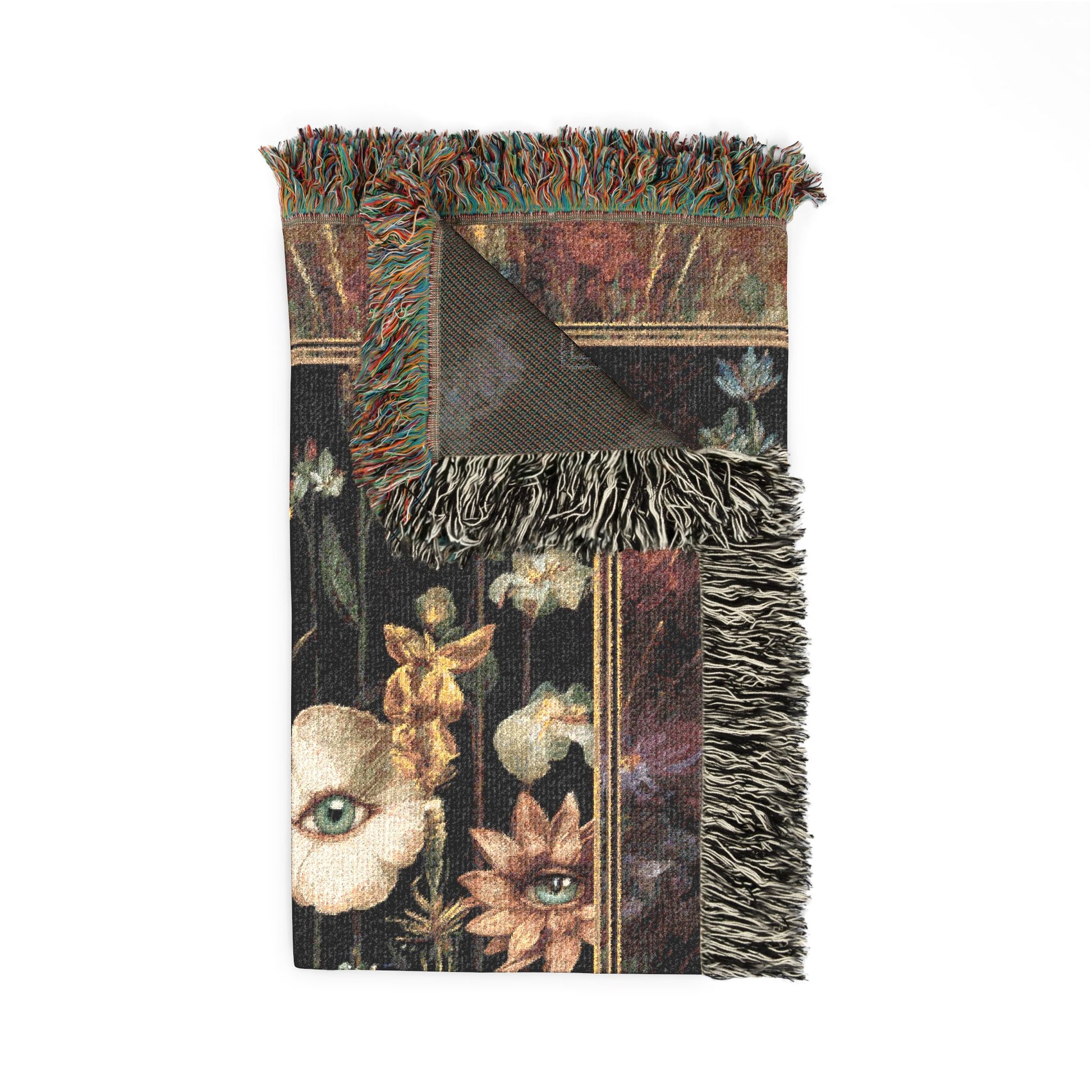 Decorative blanket with floral and animal print on a white background