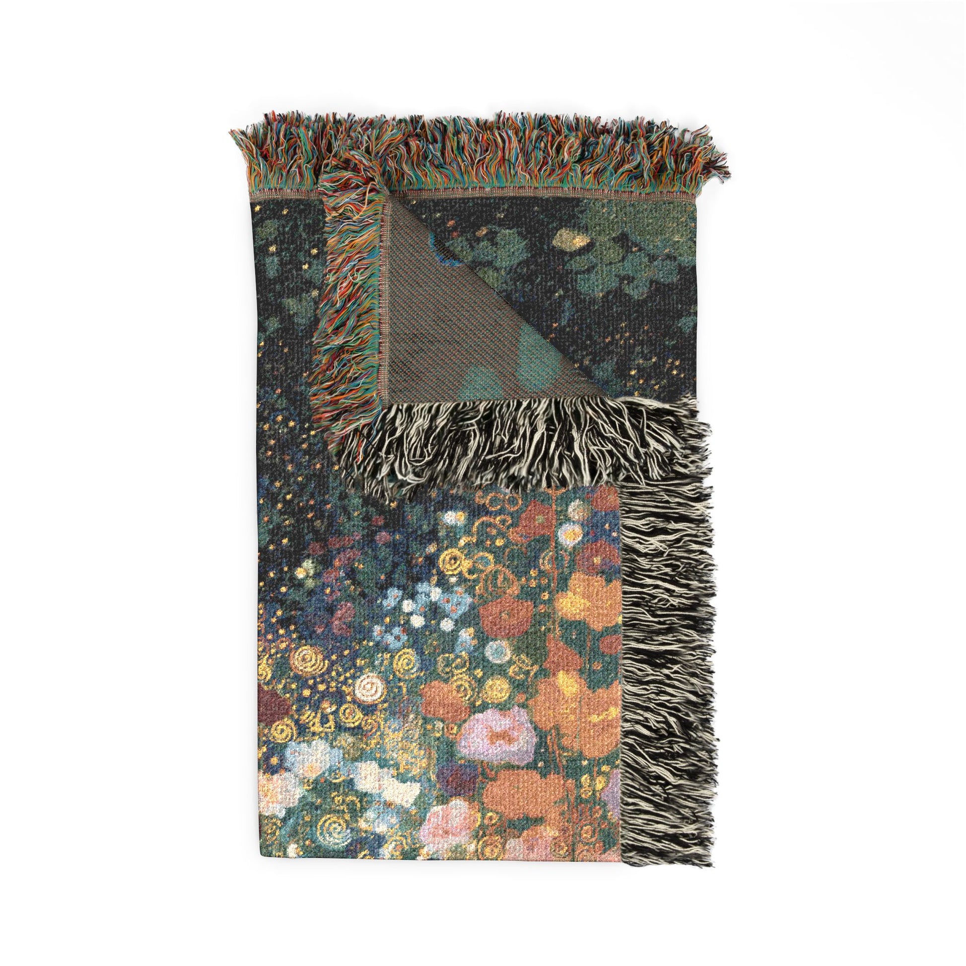 Floral patterned blanket with fringed edges on a white background