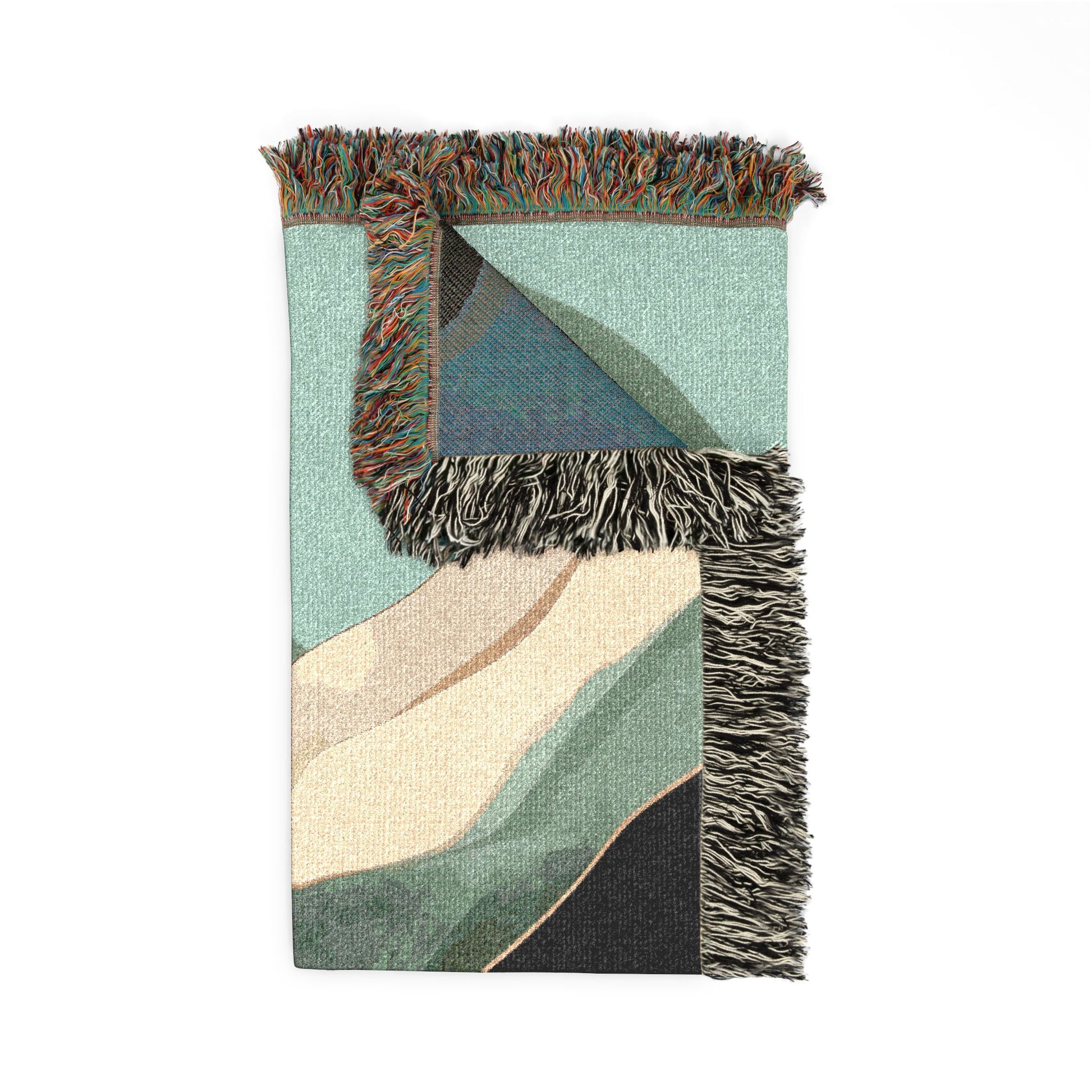 Colorful woven blanket with geometric pattern on a white background