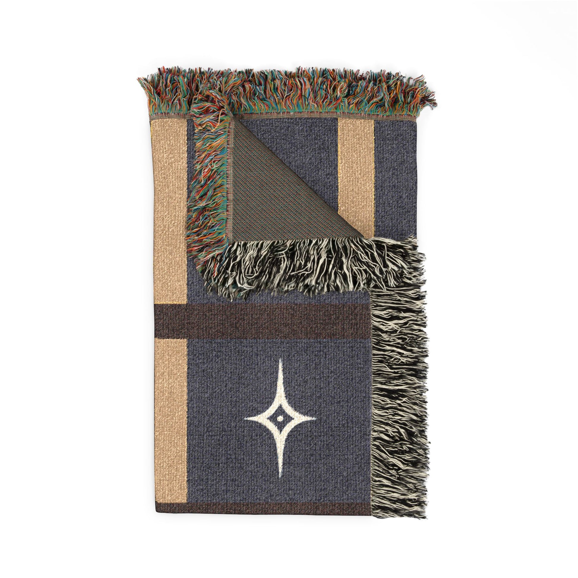 Woven blanket with star design and fringed edges on a white background