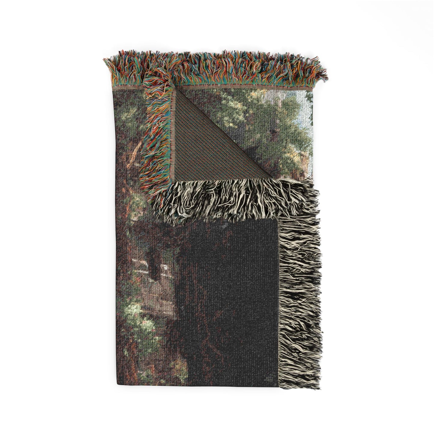 Camouflage-patterned blanket with fringed edges on a white background