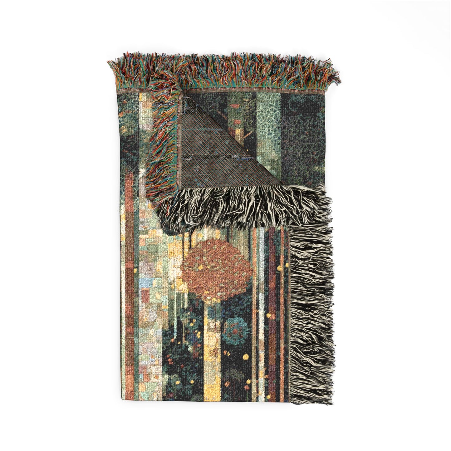 Multicolored woven blanket with fringe on a white background