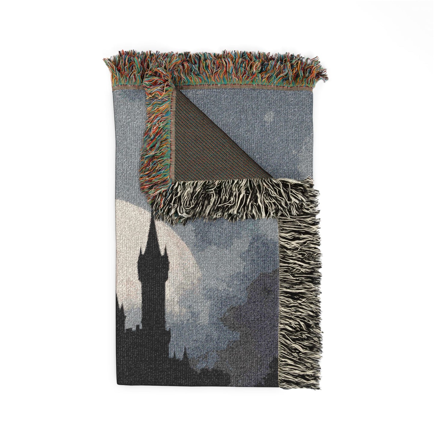 Woven blanket with fringe edges on a white background