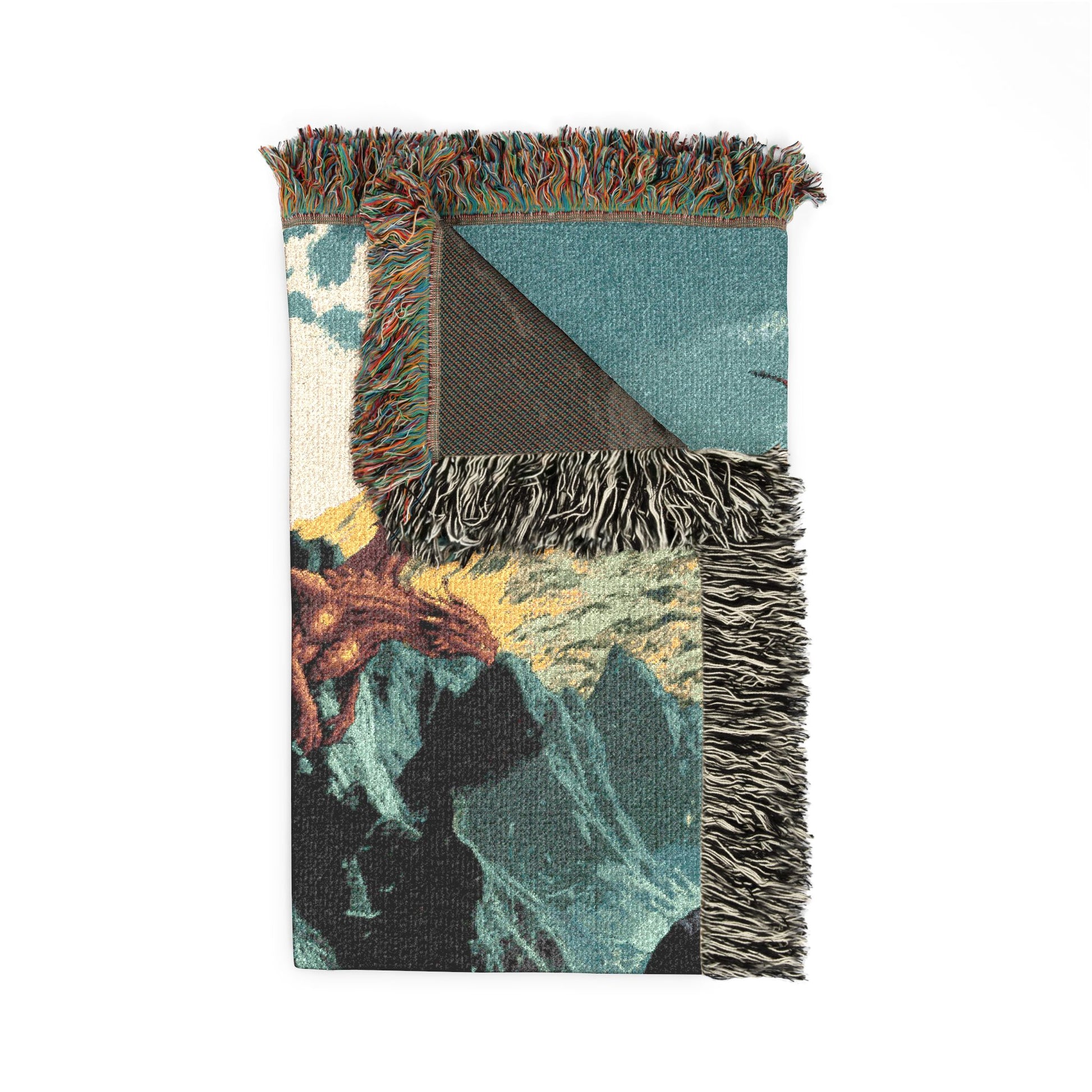 Multicolored woven blanket with fringes on a white background