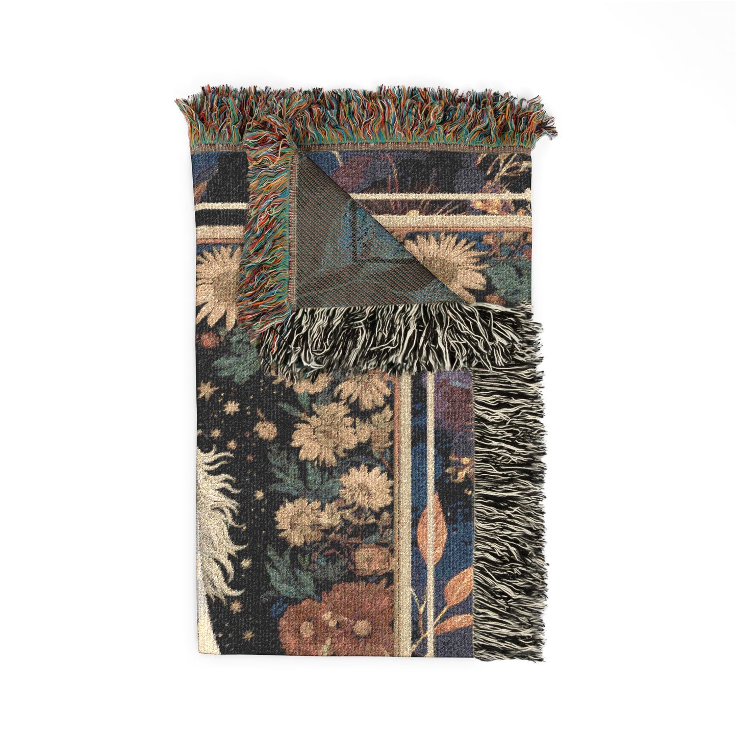 Decorative blanket with floral patterns and fringed edges on a white background