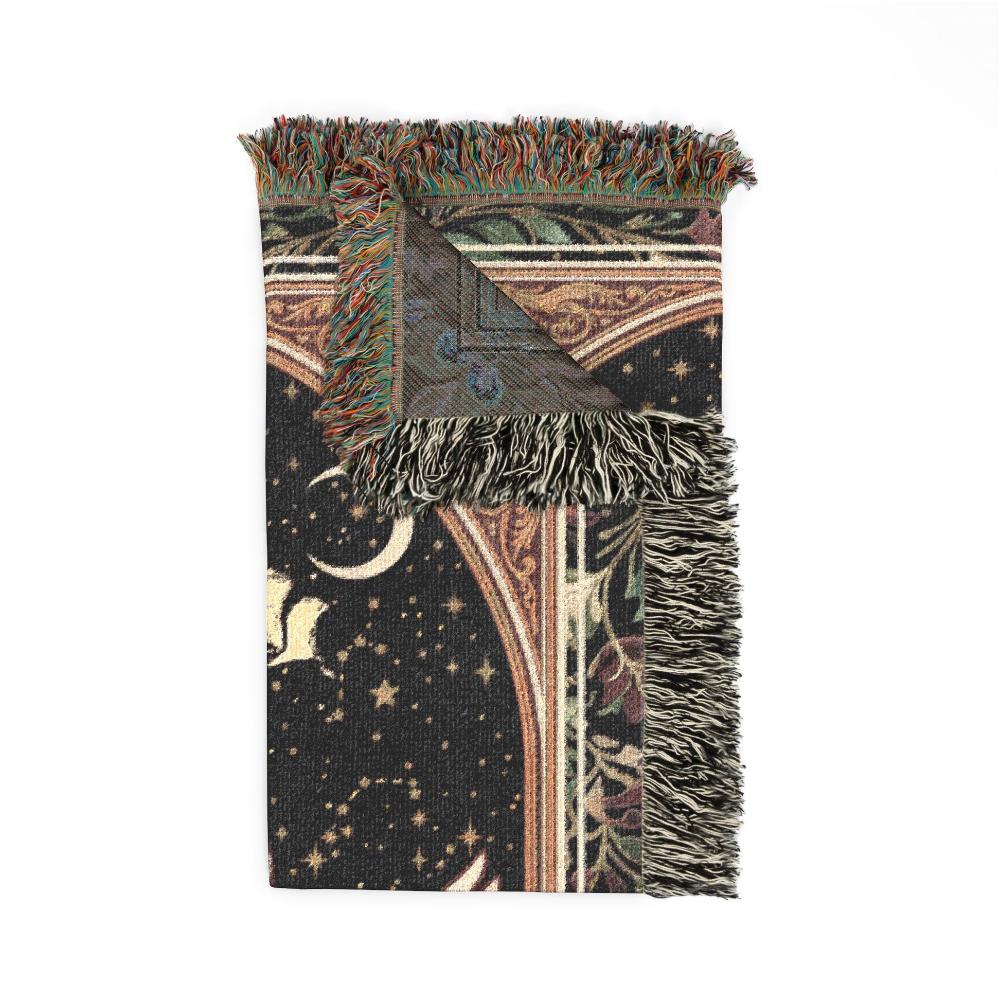Decorative throw blanket with celestial pattern and fringe on a white background