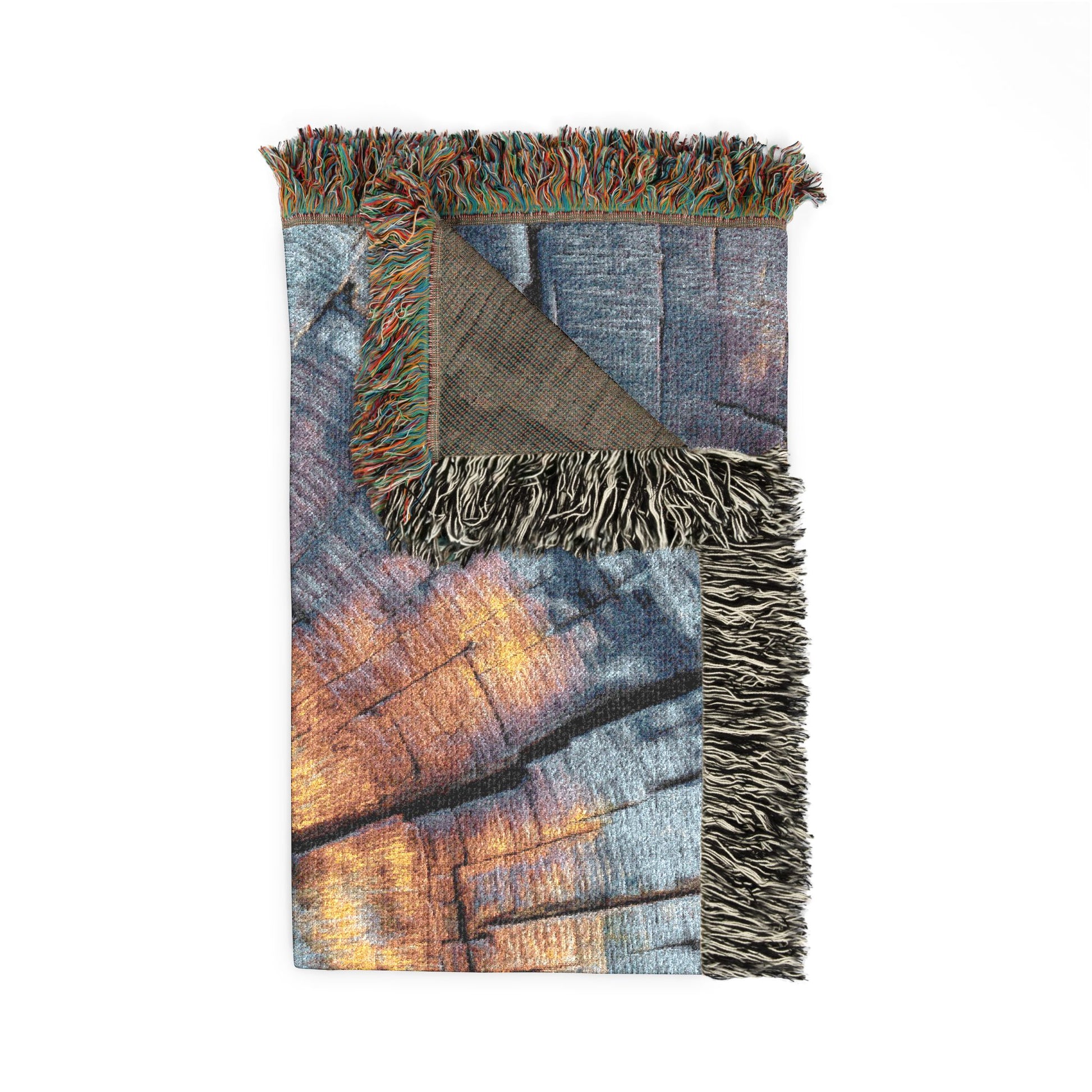 Woven Blanket with fringed edge on a white background