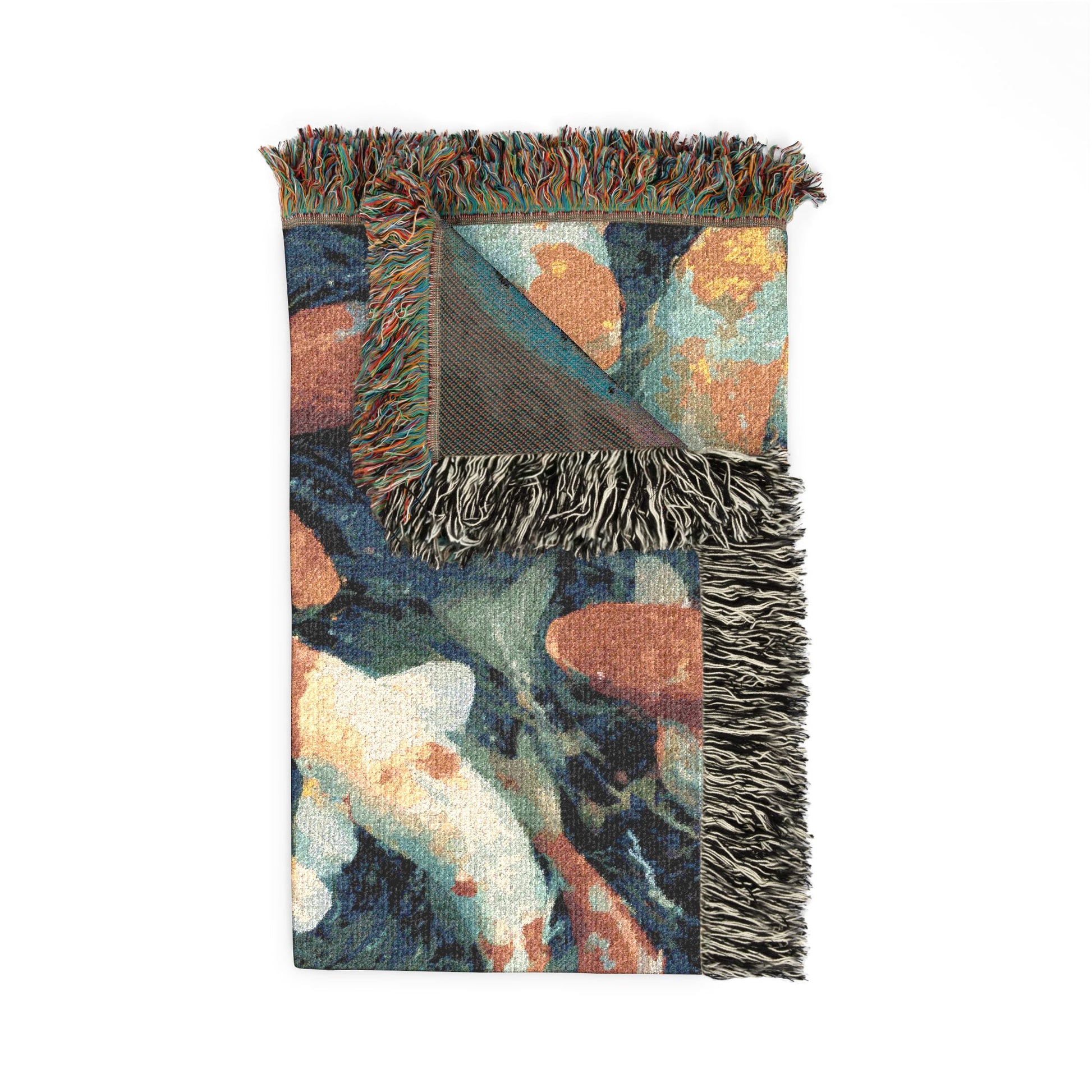 Multicolored woven blanket with fringe on a white background