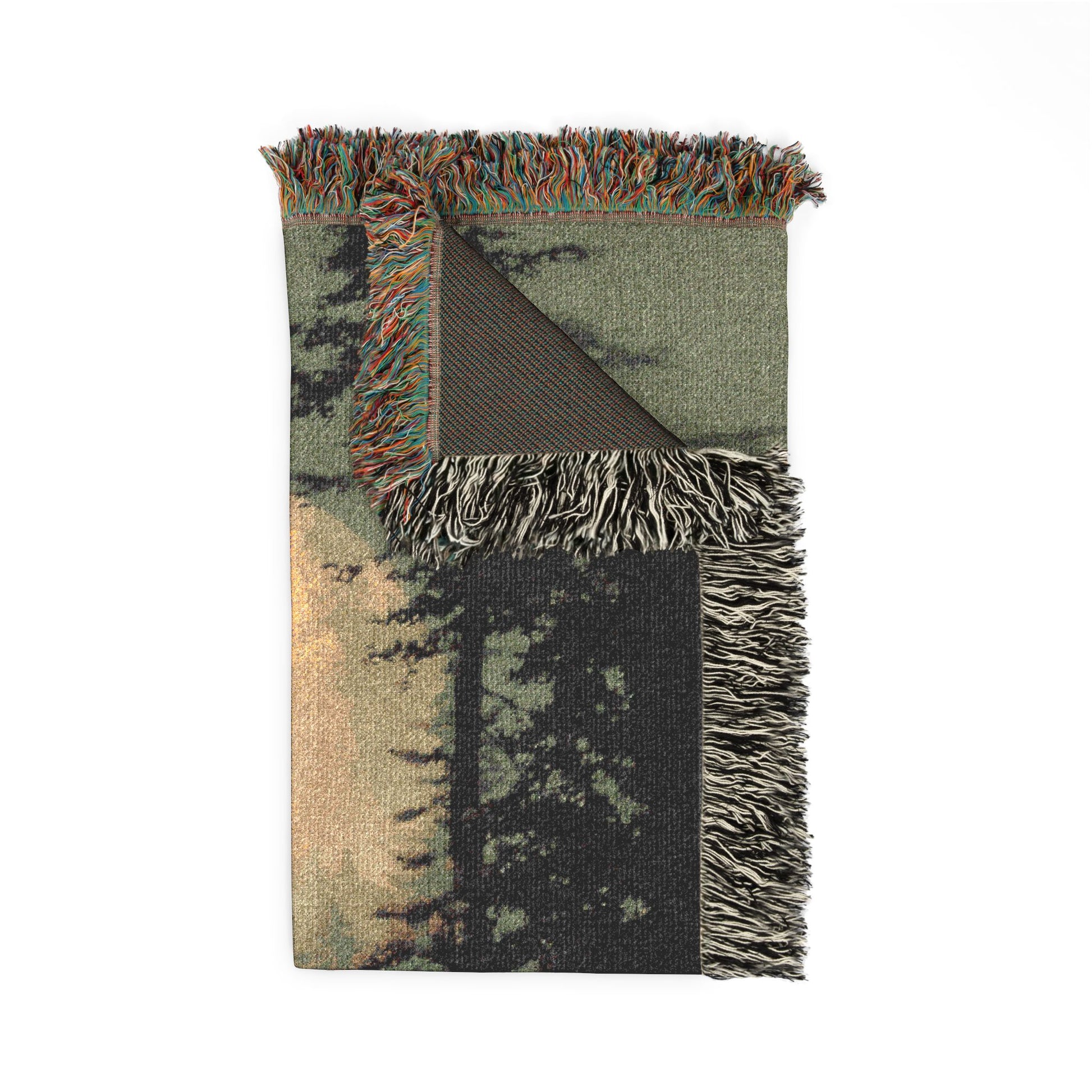 Green camouflage-patterned blanket with fringed edges on a white background