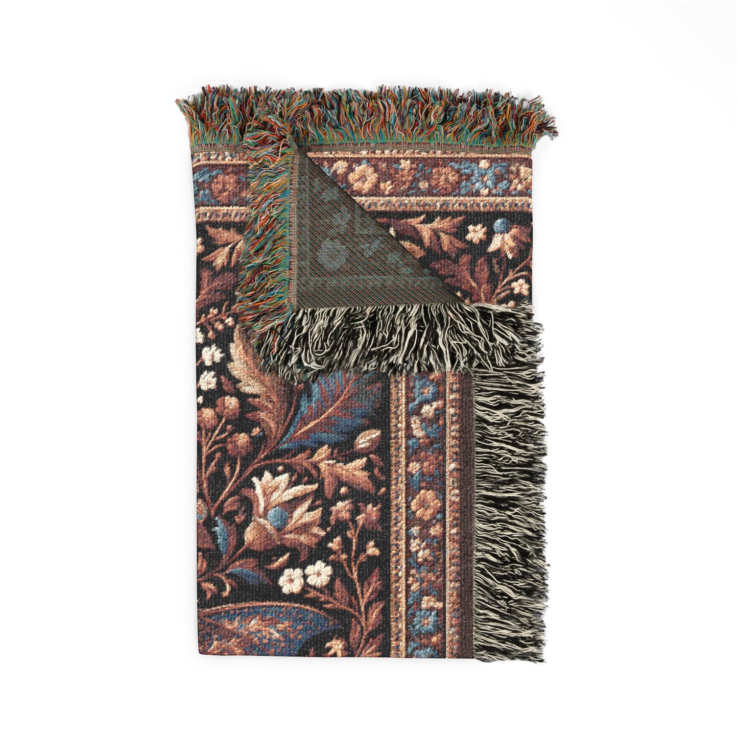 A rectangular woven throw blanket with fringed edges, featuring an intricate floral and botanical pattern in dark brown, blue, beige, and green tones, shown on a plain white background.
