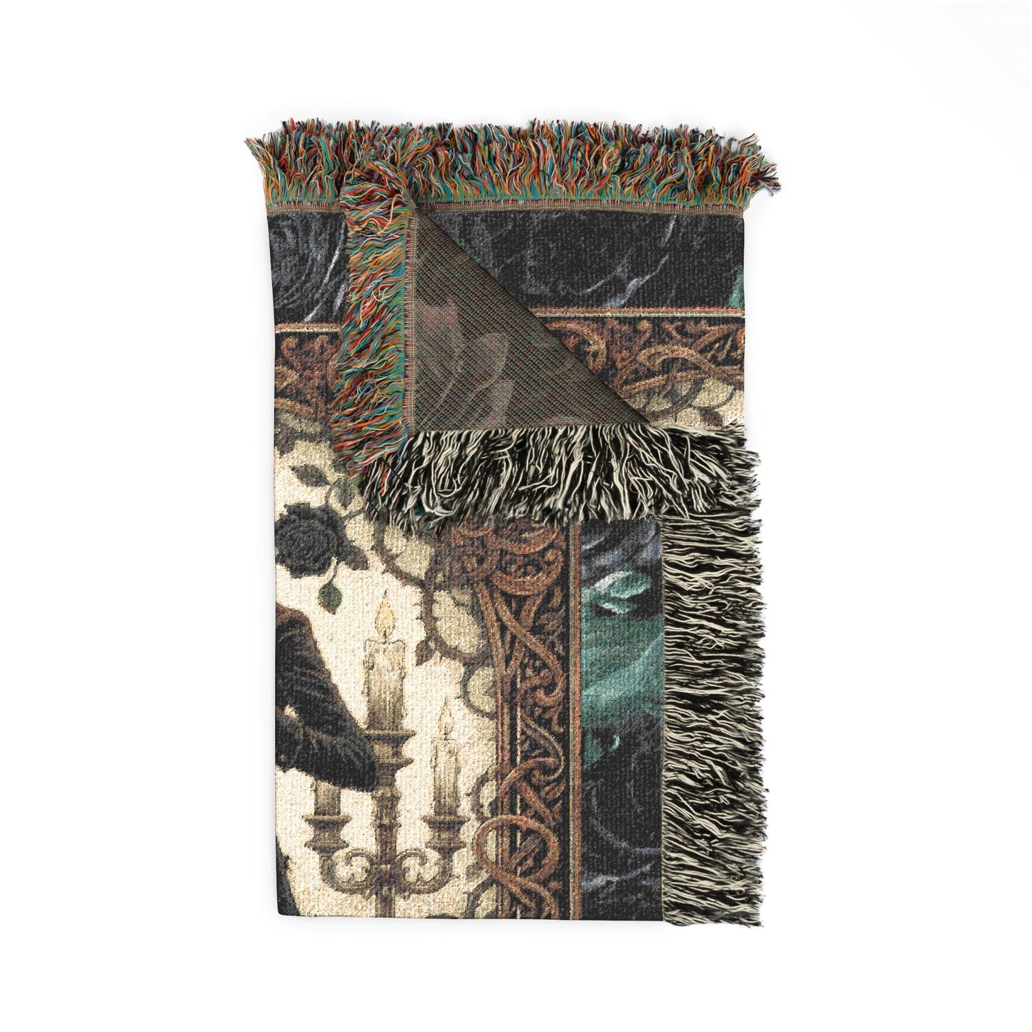 Decorative throw blanket with intricate patterns and fringes on a white background