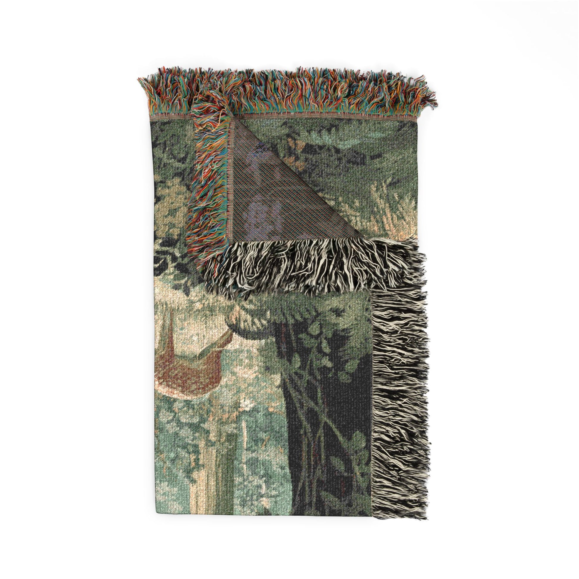 A woven throw blanket featuring a detailed landscape pattern in muted green, brown, and beige tones, finished with fringed edges.