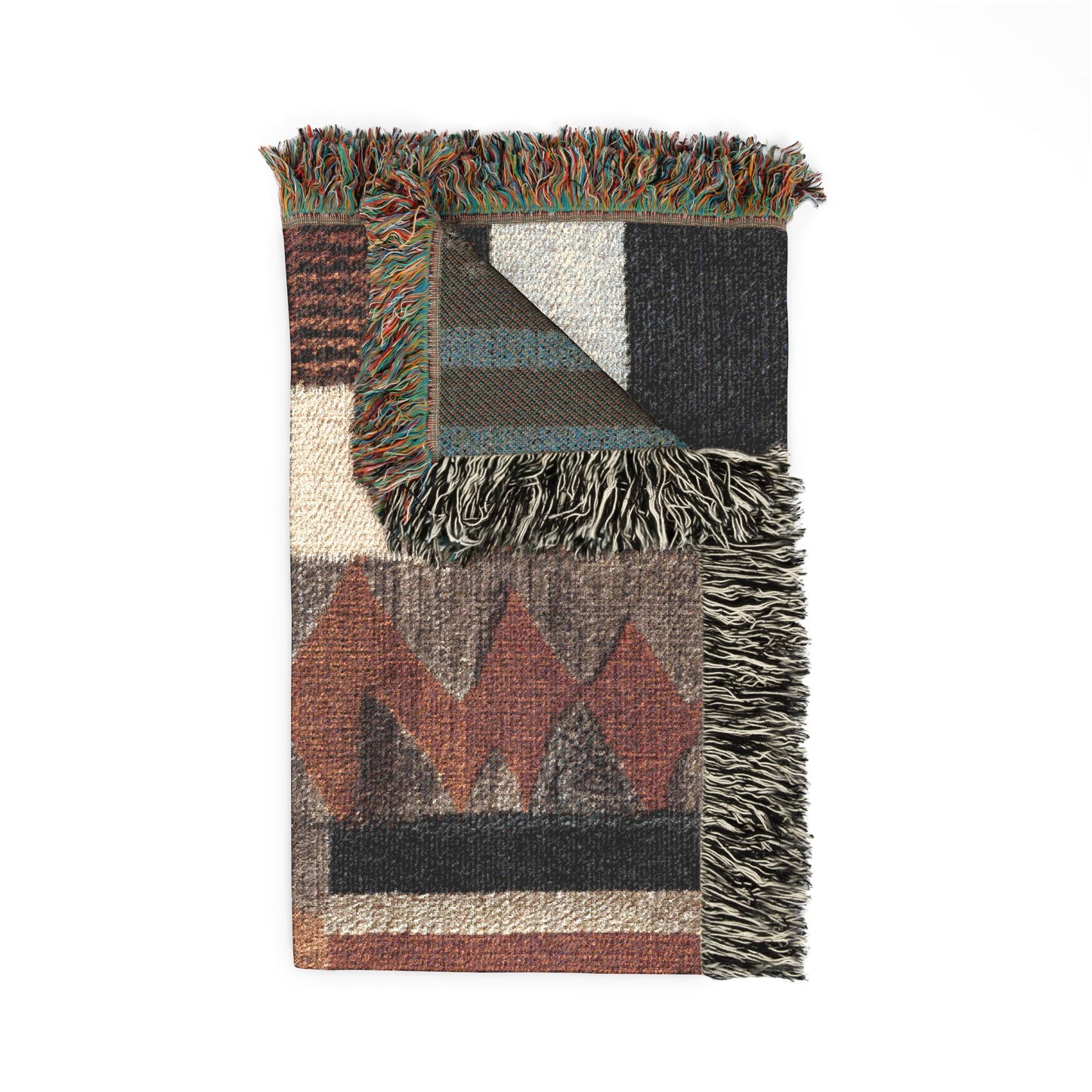 A rectangular woven throw blanket with fringe, featuring a geometric pattern in muted tones of rust red, black, beige, and blue-green, shown against a plain white background.