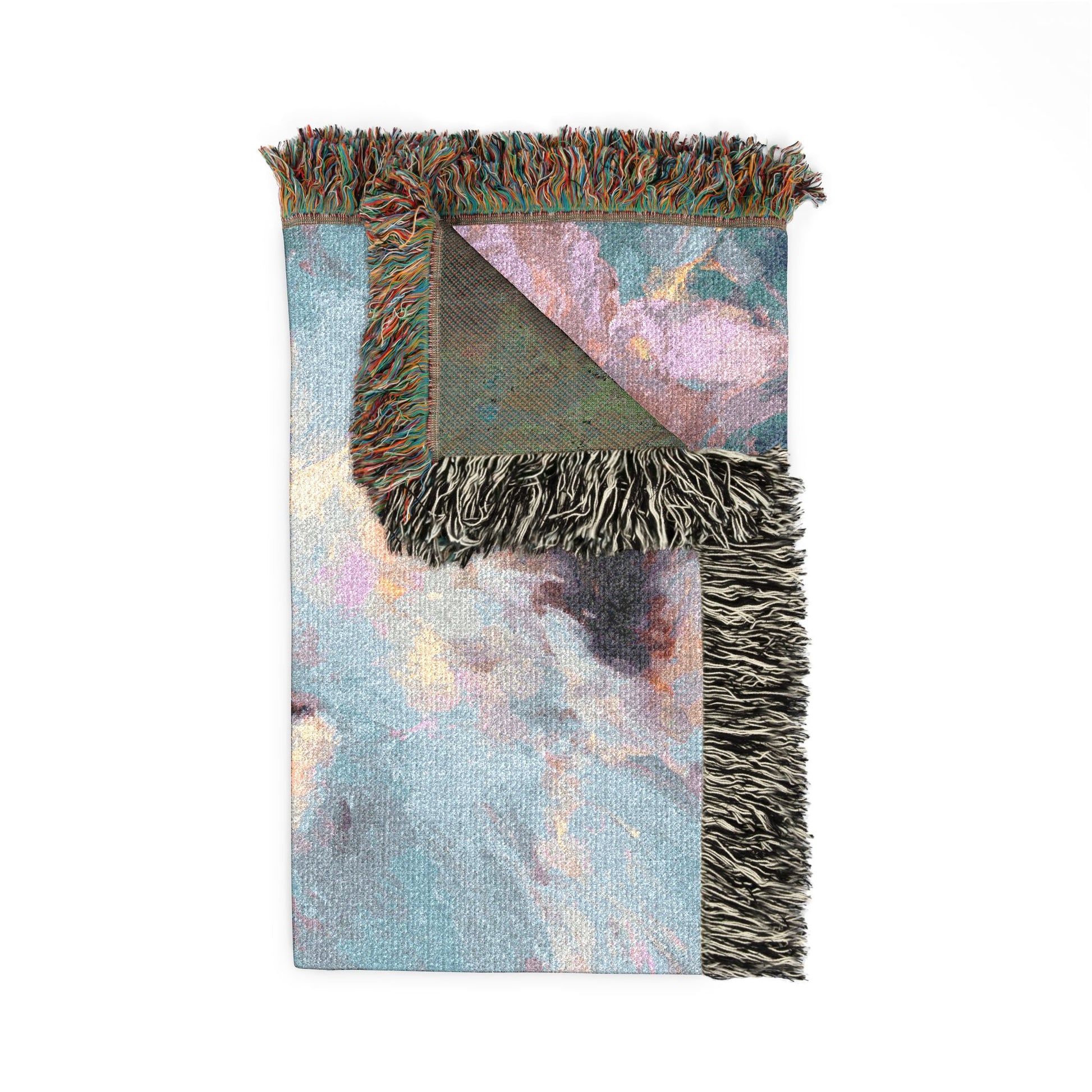 Multicolored woven blanket with fringes on a white background
