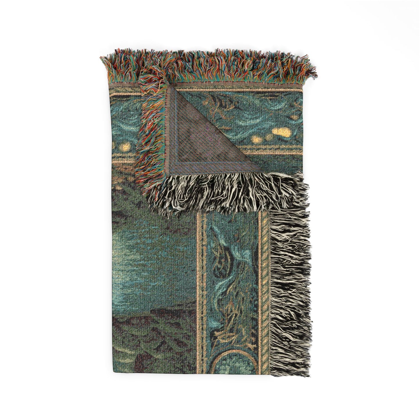 A folded woven throw blanket with fringe, featuring a teal and green fantasy landscape pattern with gold accents, shown on a plain white background.