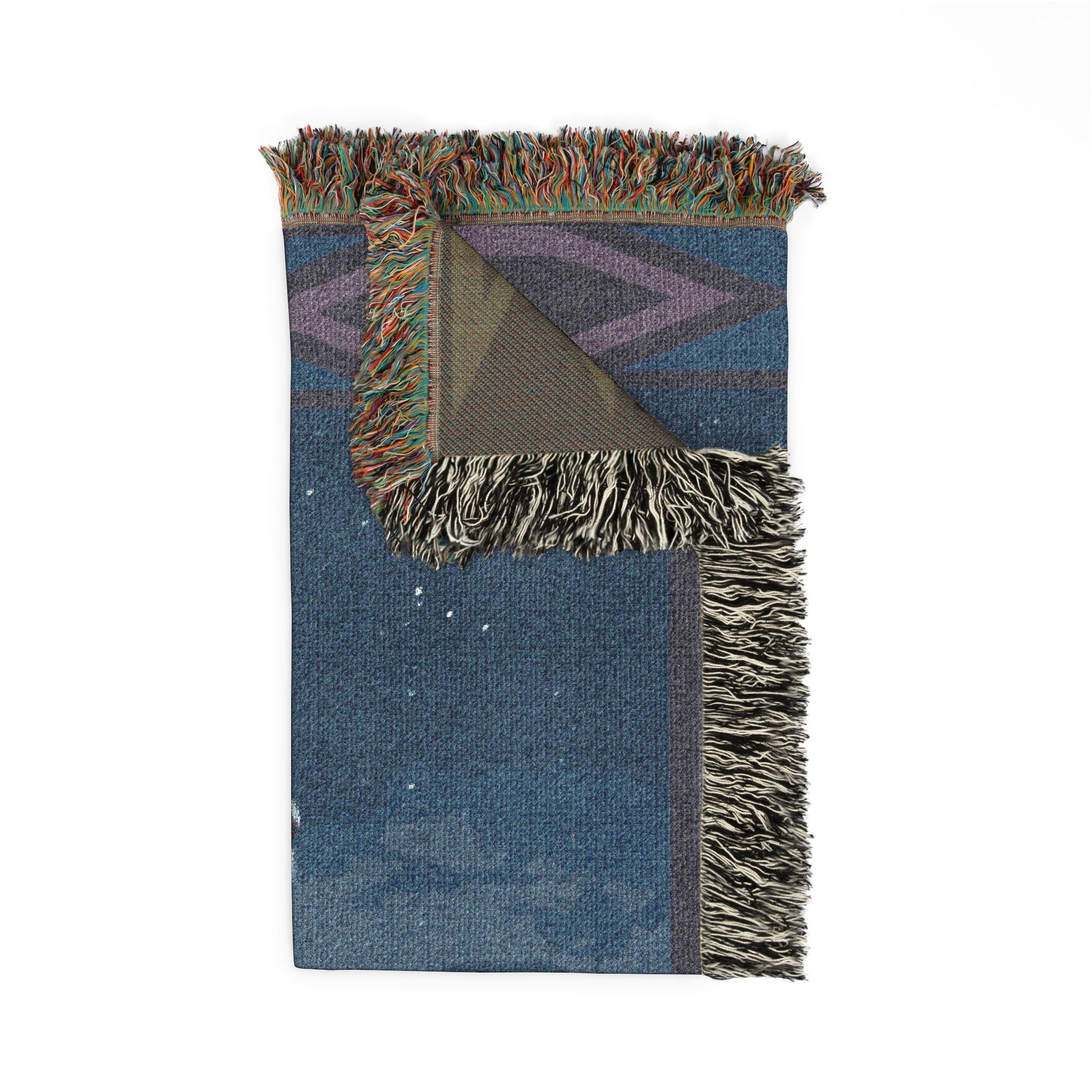 blanket with geometric pattern and fringed edges on a white background