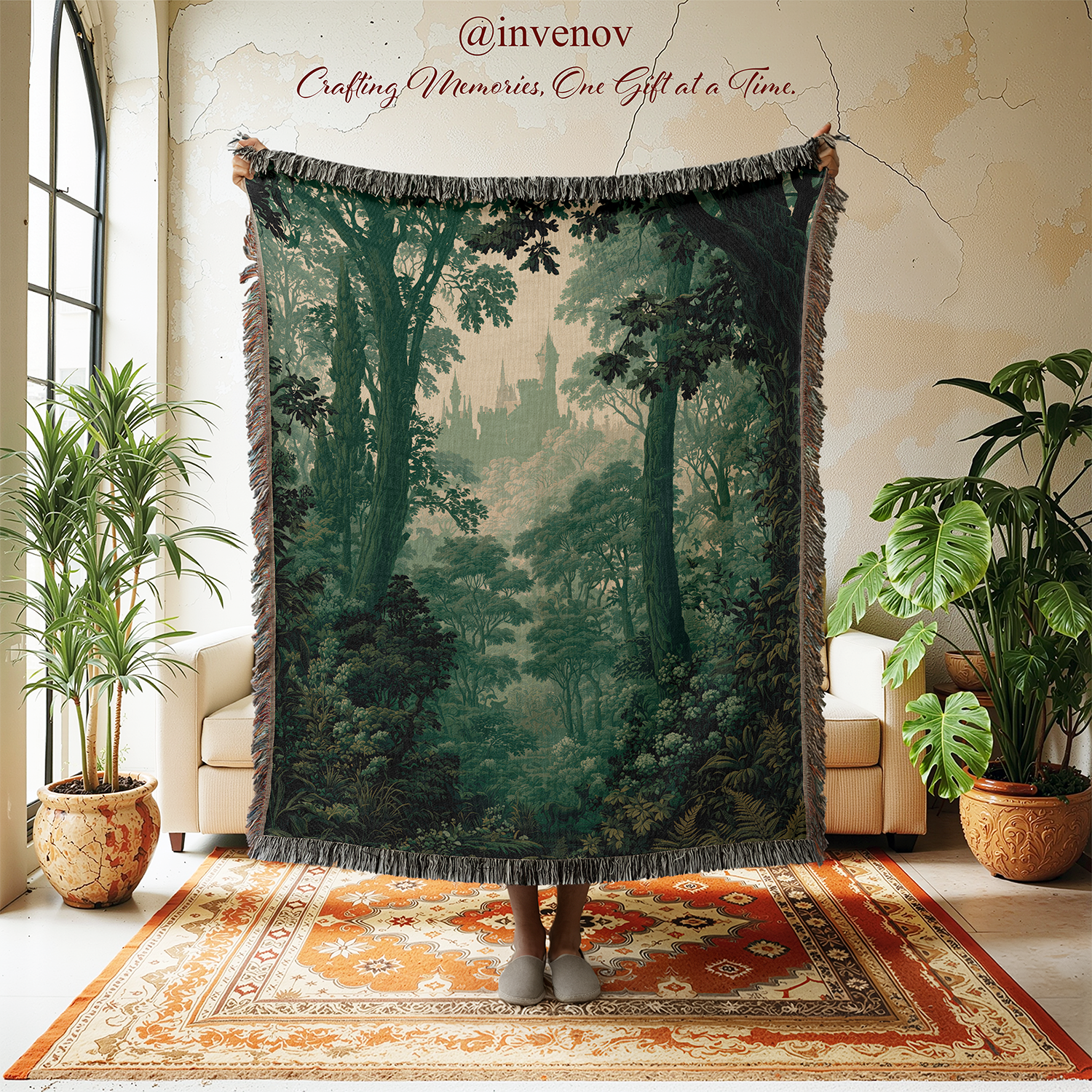A large woven tapestry featuring a dark forest scene with tall trees and a castle in the distance, held up in a room with plants, chairs, and a patterned rug. The tapestry has dark gray fringe along the top and bottom edges.