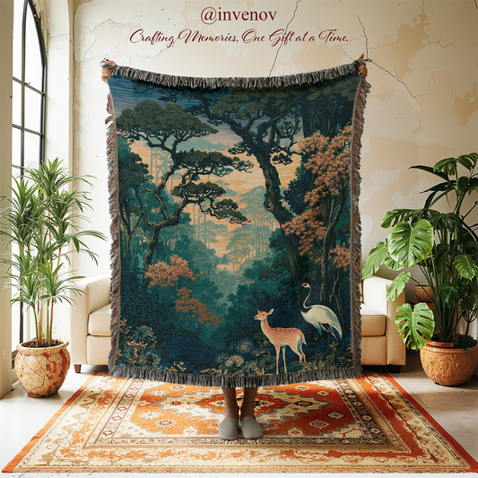 A large woven tapestry with fringe edges hangs in a styled room. The tapestry features a forest scene with a deer and a white bird, while a person's legs and feet are visible underneath holding it up.
