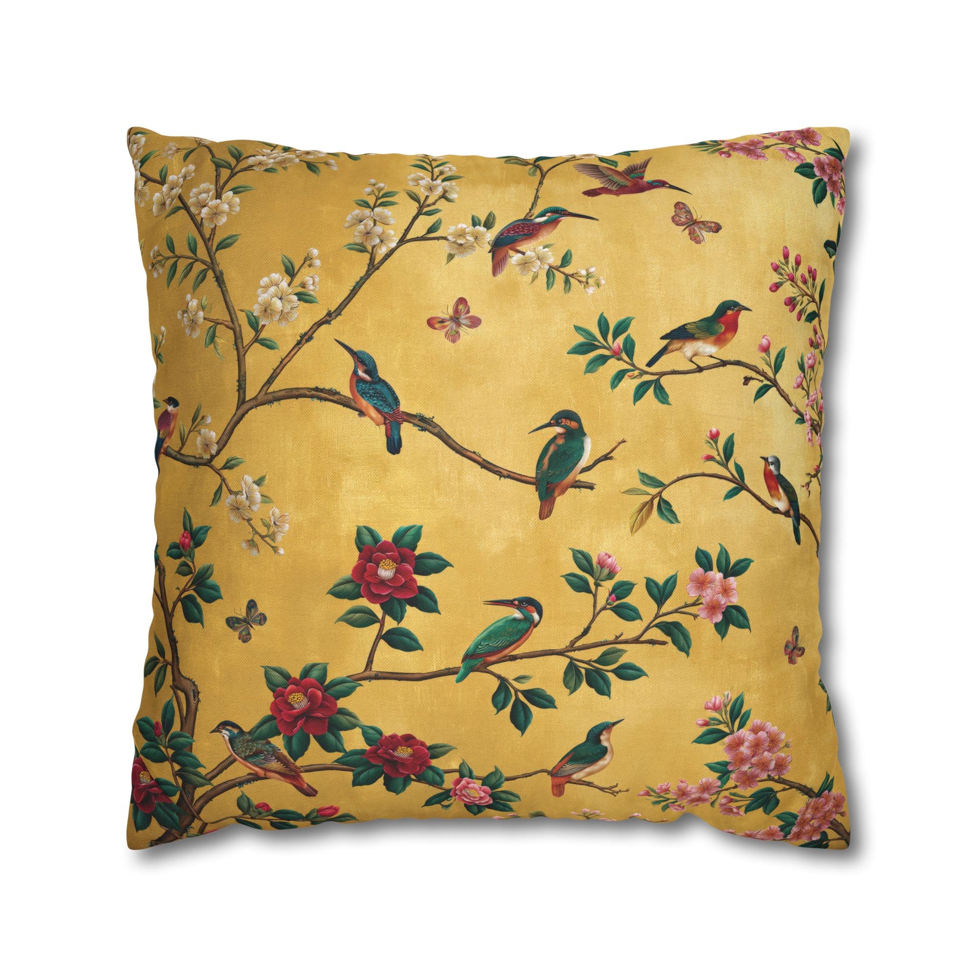 Decorative pillow with bird and floral pattern on a yellow background