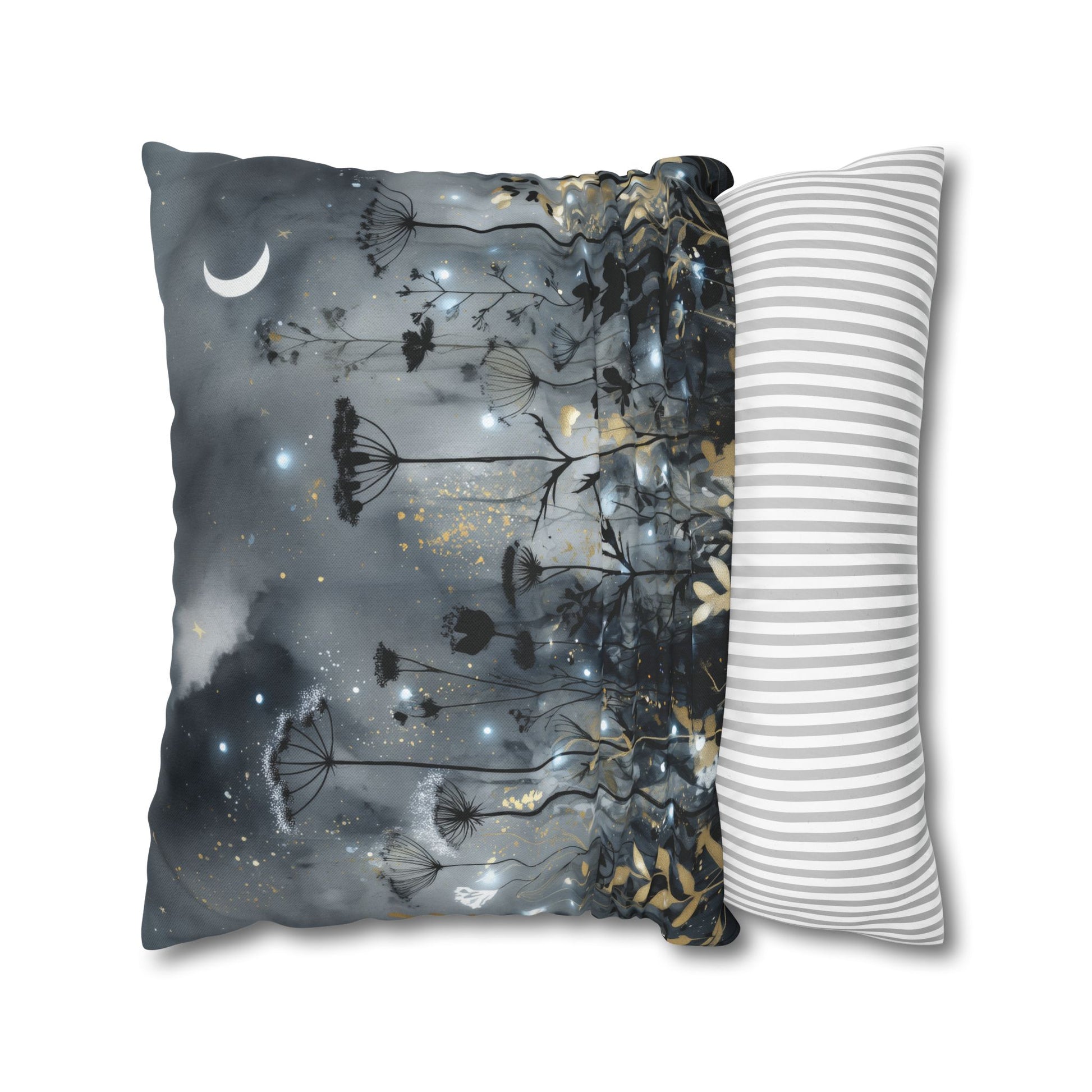 Decorative pillow with nature-themed design and a striped pillow next to it on a white background
