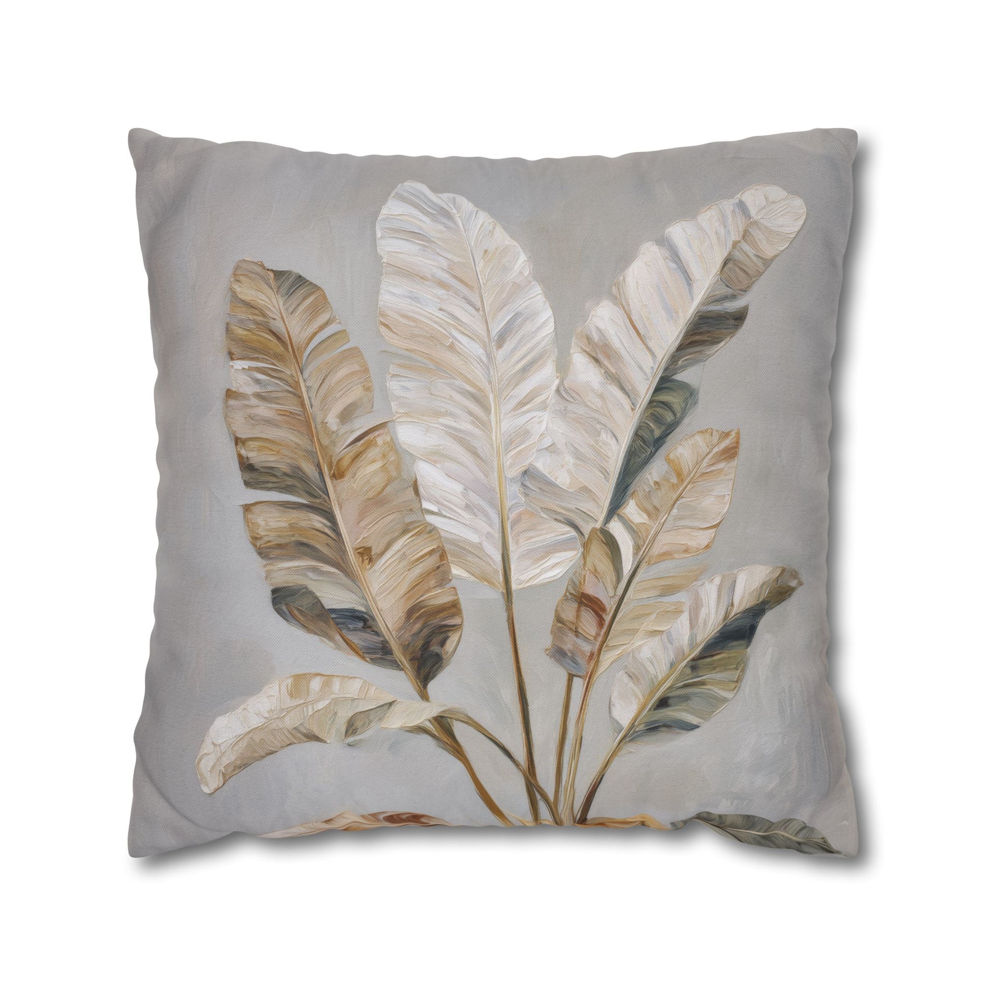 Decorative pillow with leaf pattern on a gray background