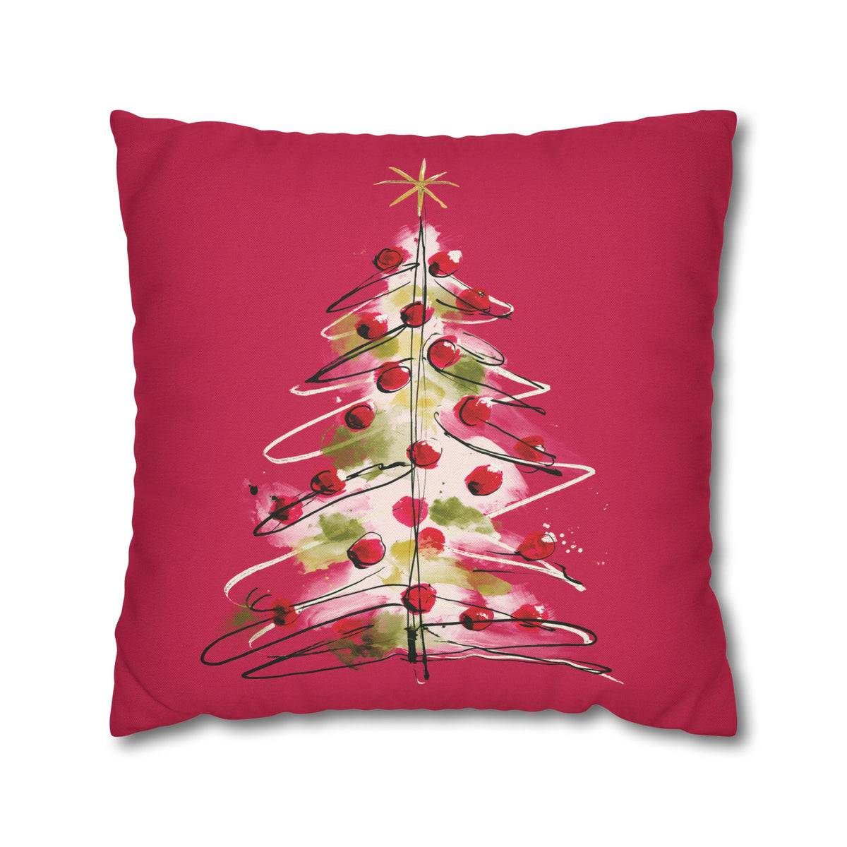 A square pink throw pillow featuring a watercolor-style Christmas tree design with red ornaments, green leaves, and a gold star on a white background.