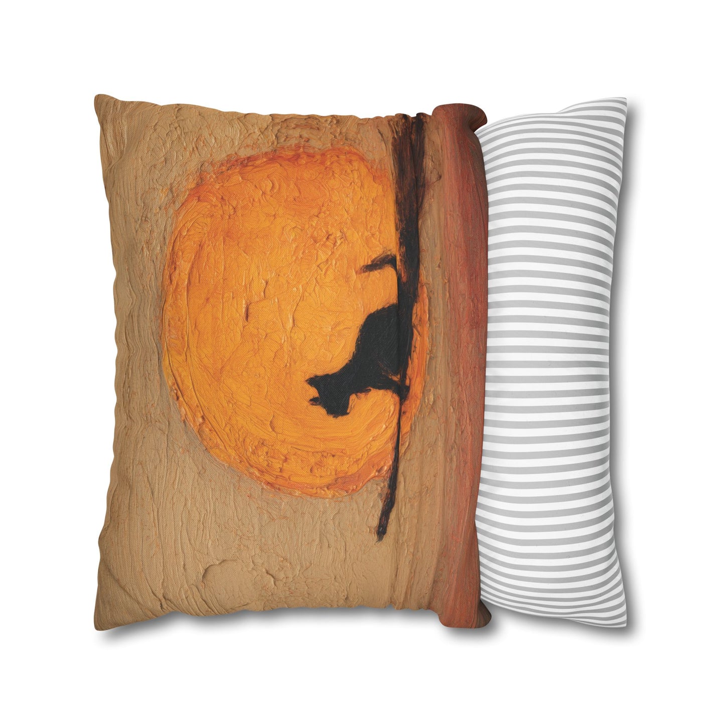 A decorative throw pillow shown on a white background, featuring a printed design of a black cat silhouette against a large orange circular motif on a tan textured background, with a striped side panel in white and gray.
