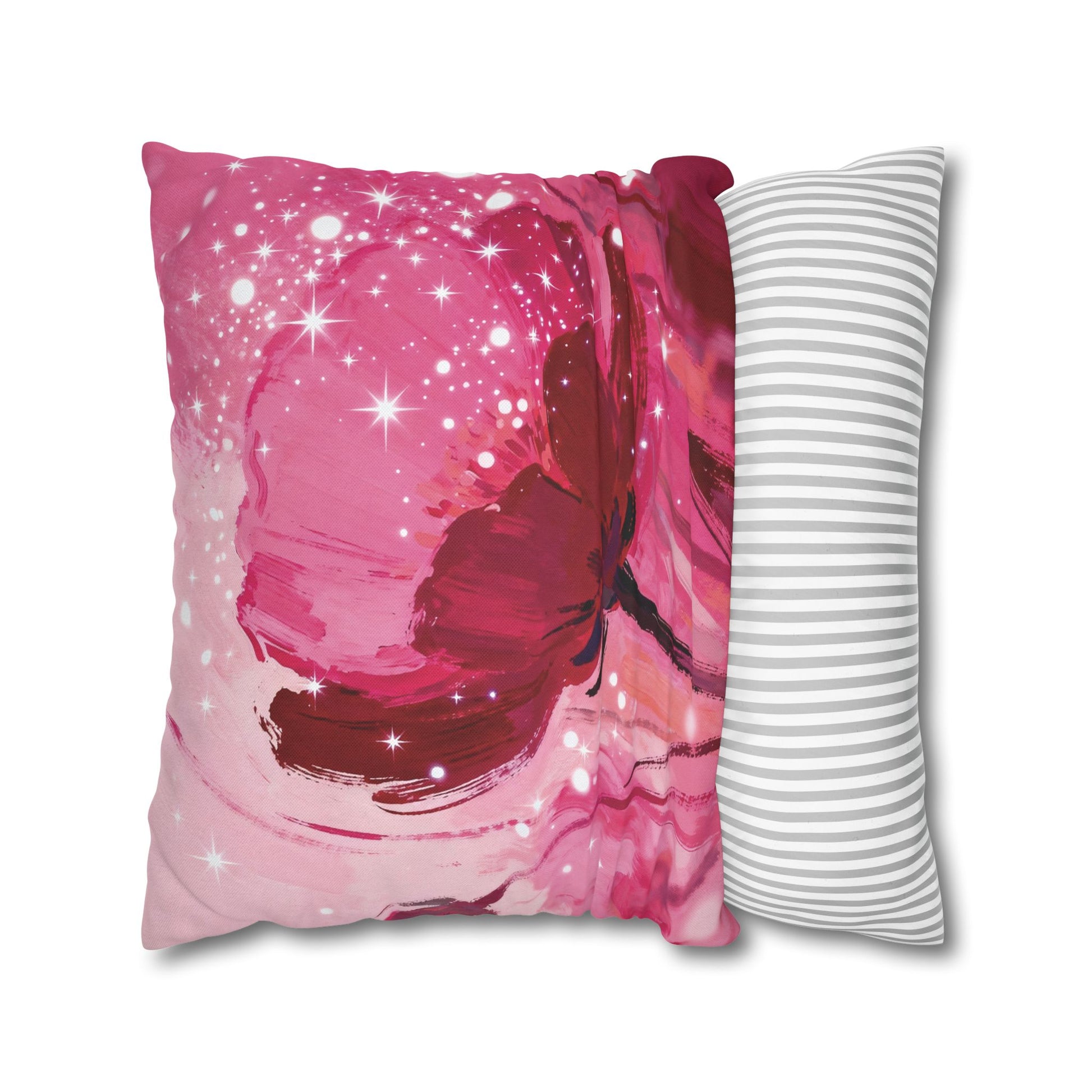 pillow with a pink butterfly design with a white and gray striped pattern, on a white background.