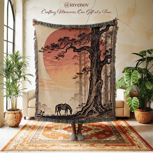 Decorative wall hanging with tree and sunset design in a room with plants and furniture.