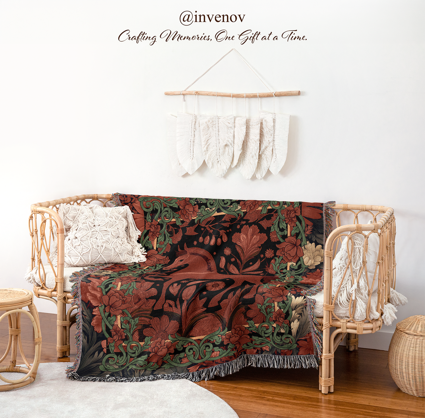 Decorative blanket with floral pattern draped over a wicker chair