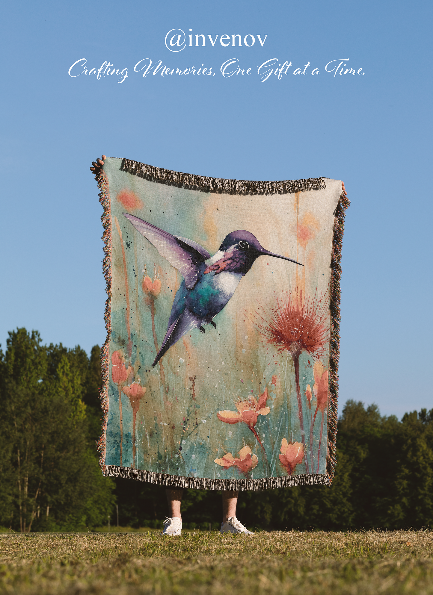Woven Blanket with a humming bird and some flowers graphic