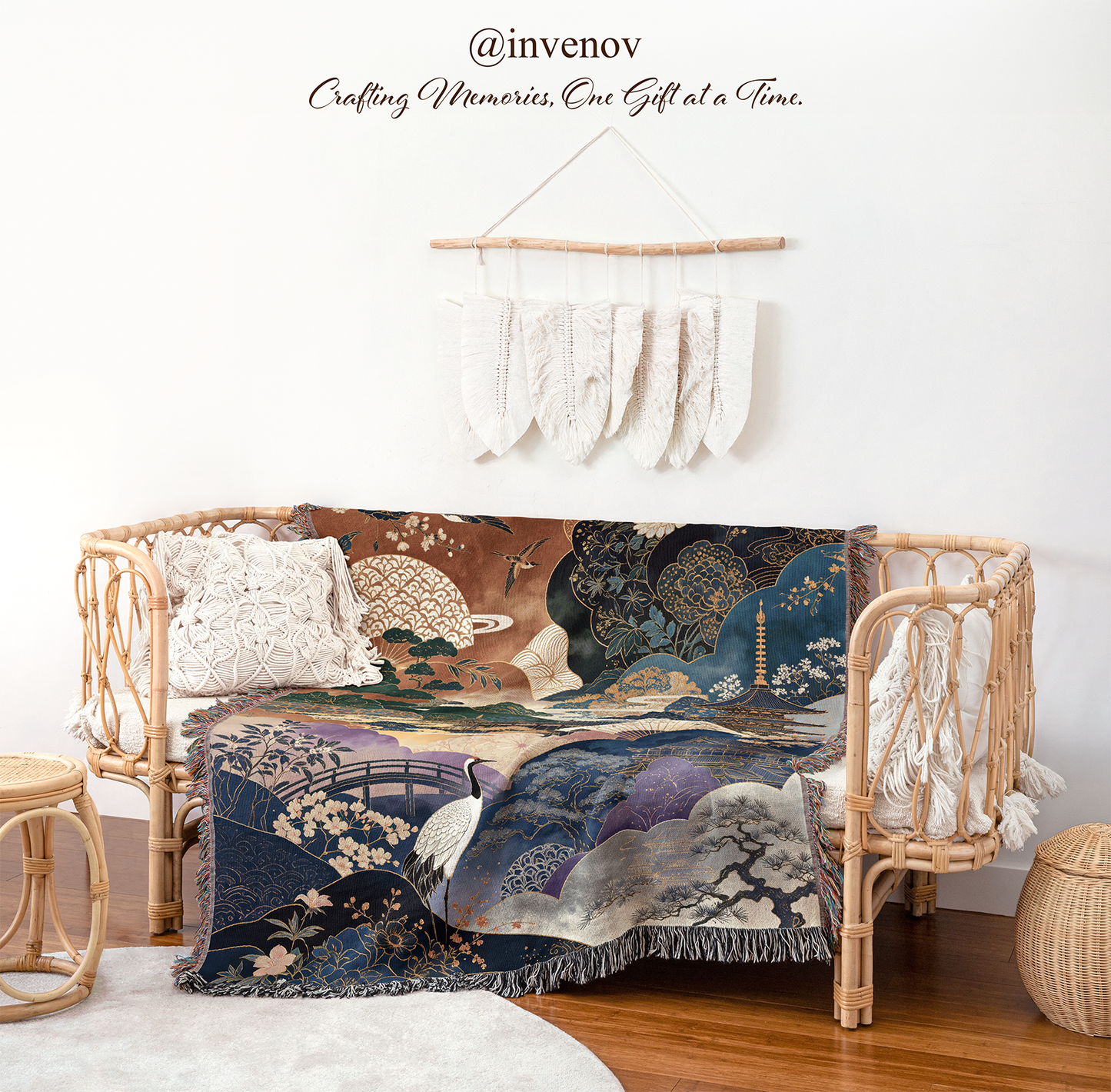 Decorative blanket with artistic design draped over a wicker chair