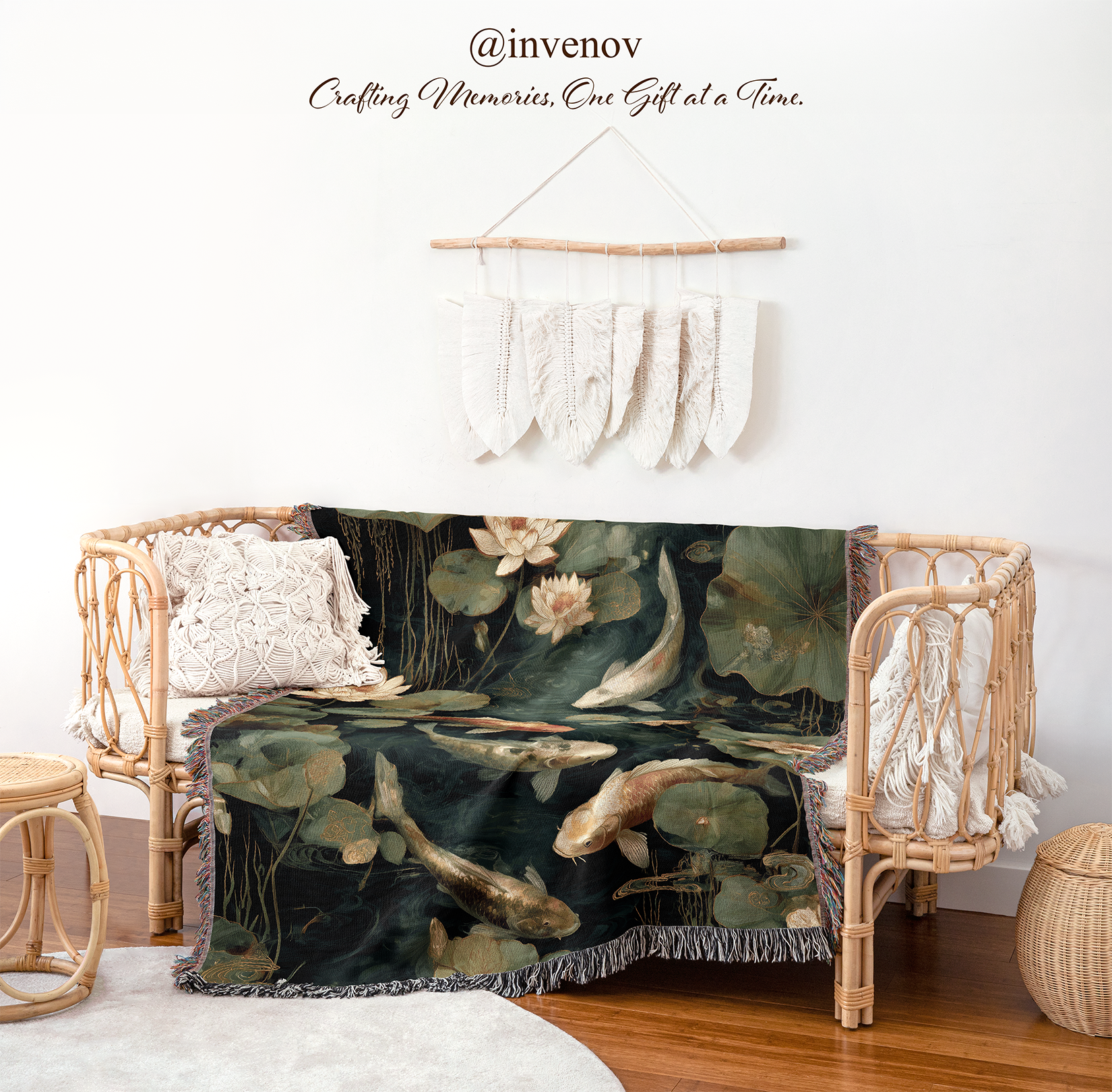 Decorative blanket with fish and lotus design draped over a wicker chair