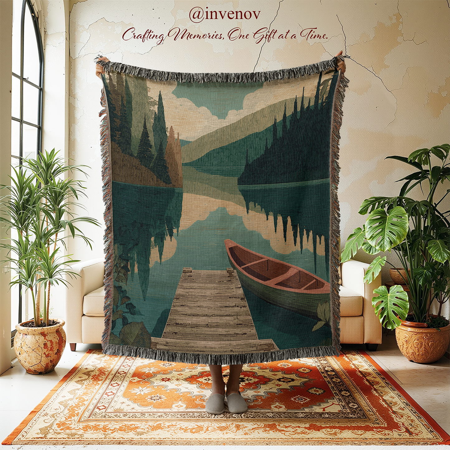 Decorative throw blanket with a nature scene of a lake and canoe, displayed in a room with plants and furniture.