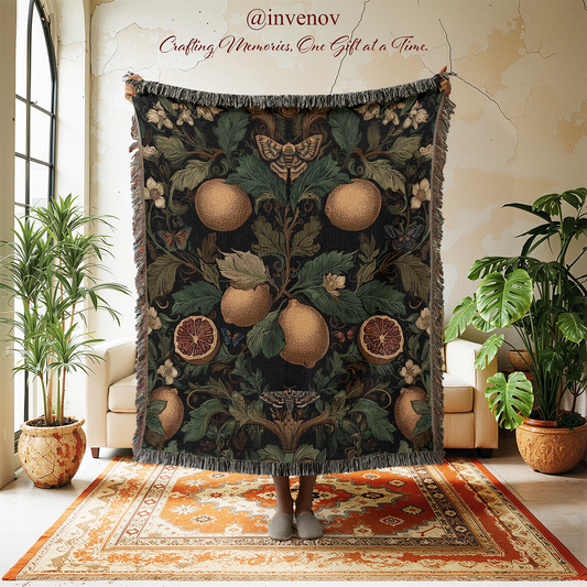 Decorative tapestry with fruit design hanging in a room with plants and furniture.