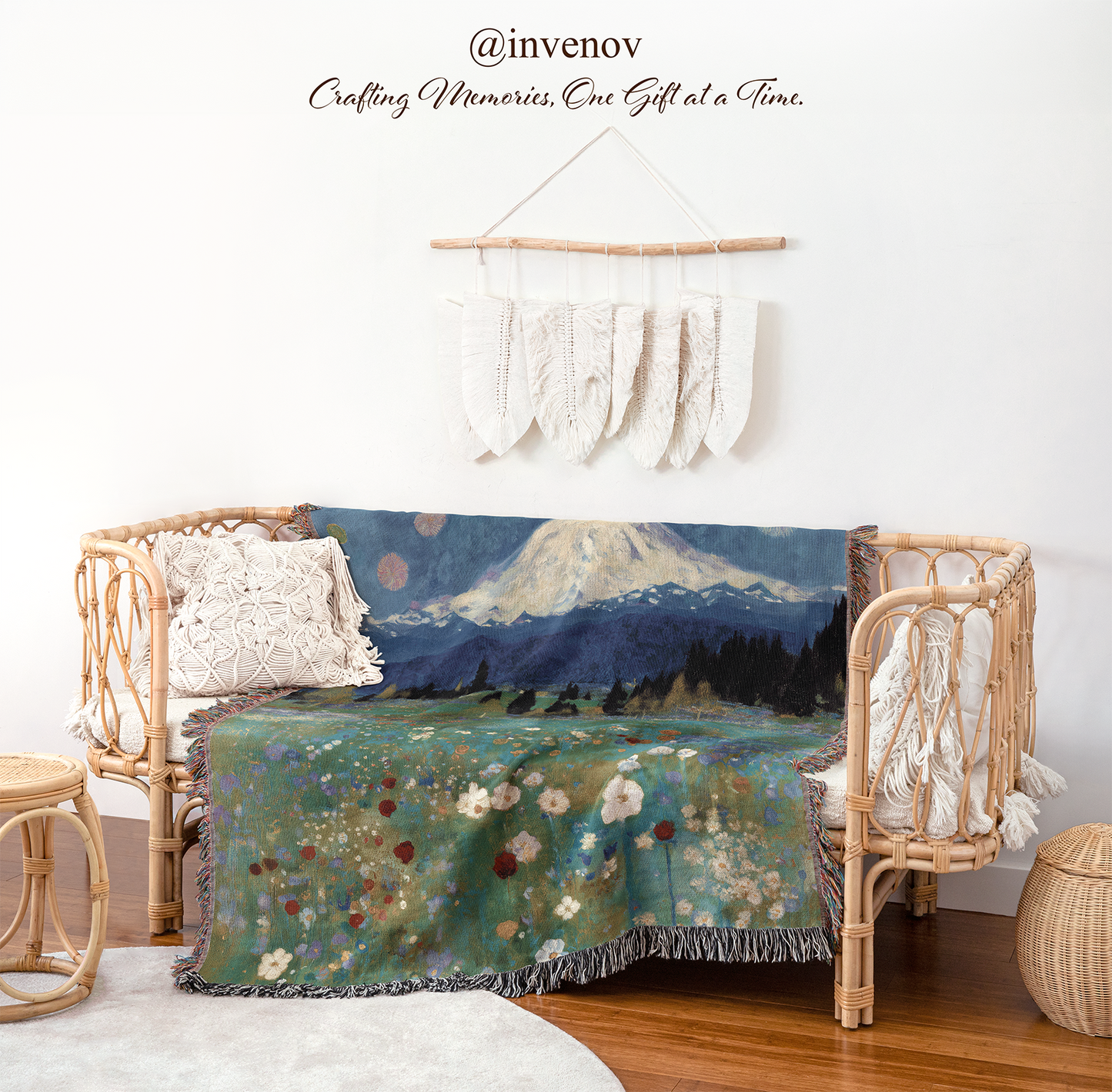 Decorative blanket with mountain and nature design draped over a chair