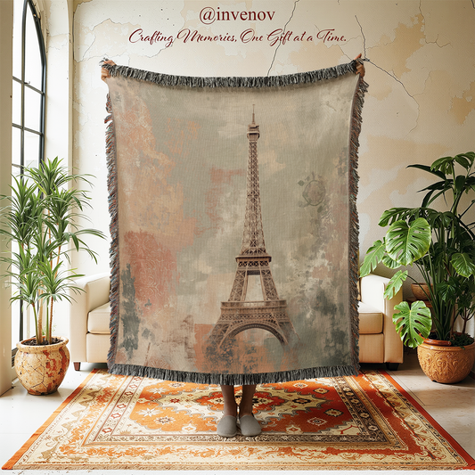 Woven blanket with Eiffel Tower design  in a room with plants and furniture.