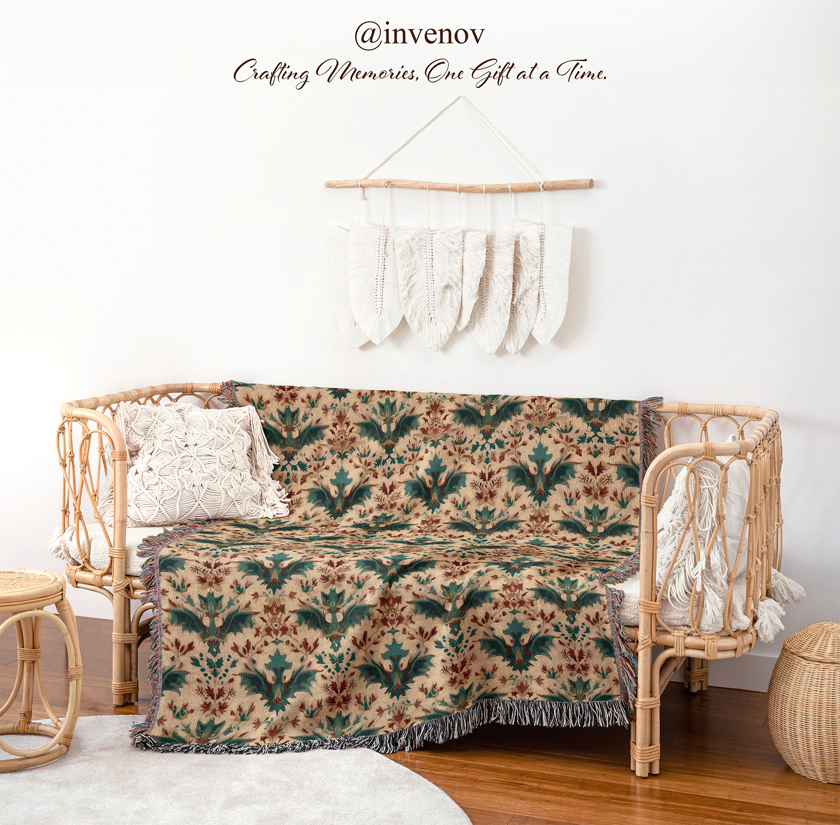 Decorative blanket with a leaf pattern draped over a wicker chair