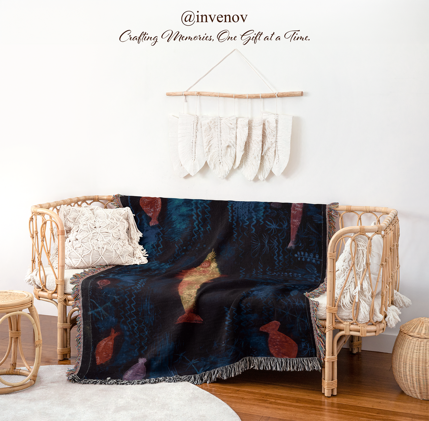 Decorative blanket with fish pattern draped over a wicker chair