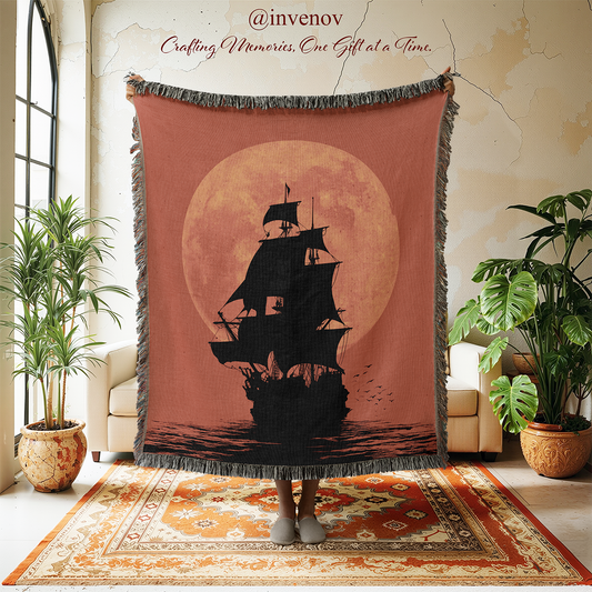 Decorative blanket with a ship design  a room with plants and furniture.