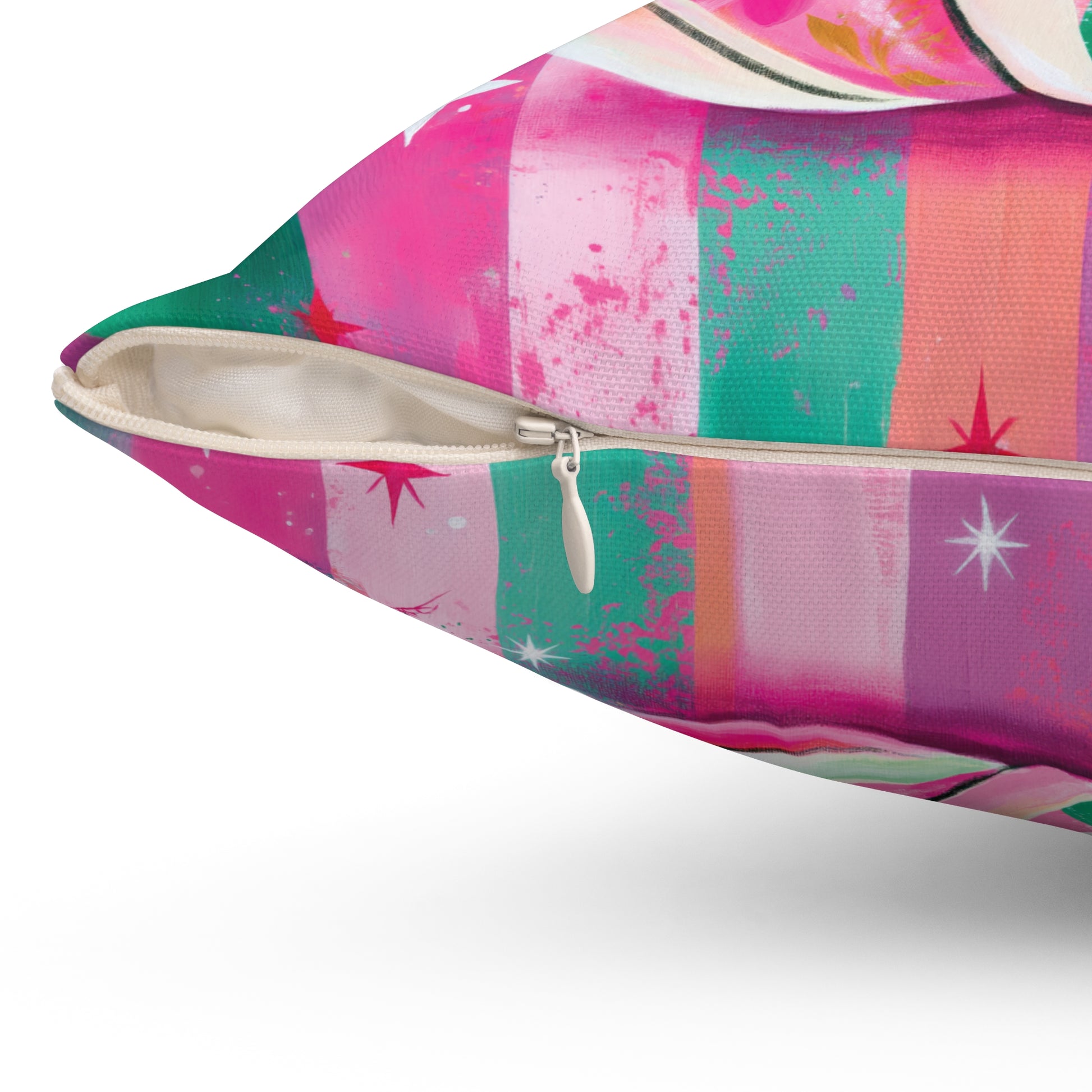 A close-up of a zippered throw pillow featuring a colorful vertical stripe pattern with pink, teal, orange, and purple tones, along with star motifs.