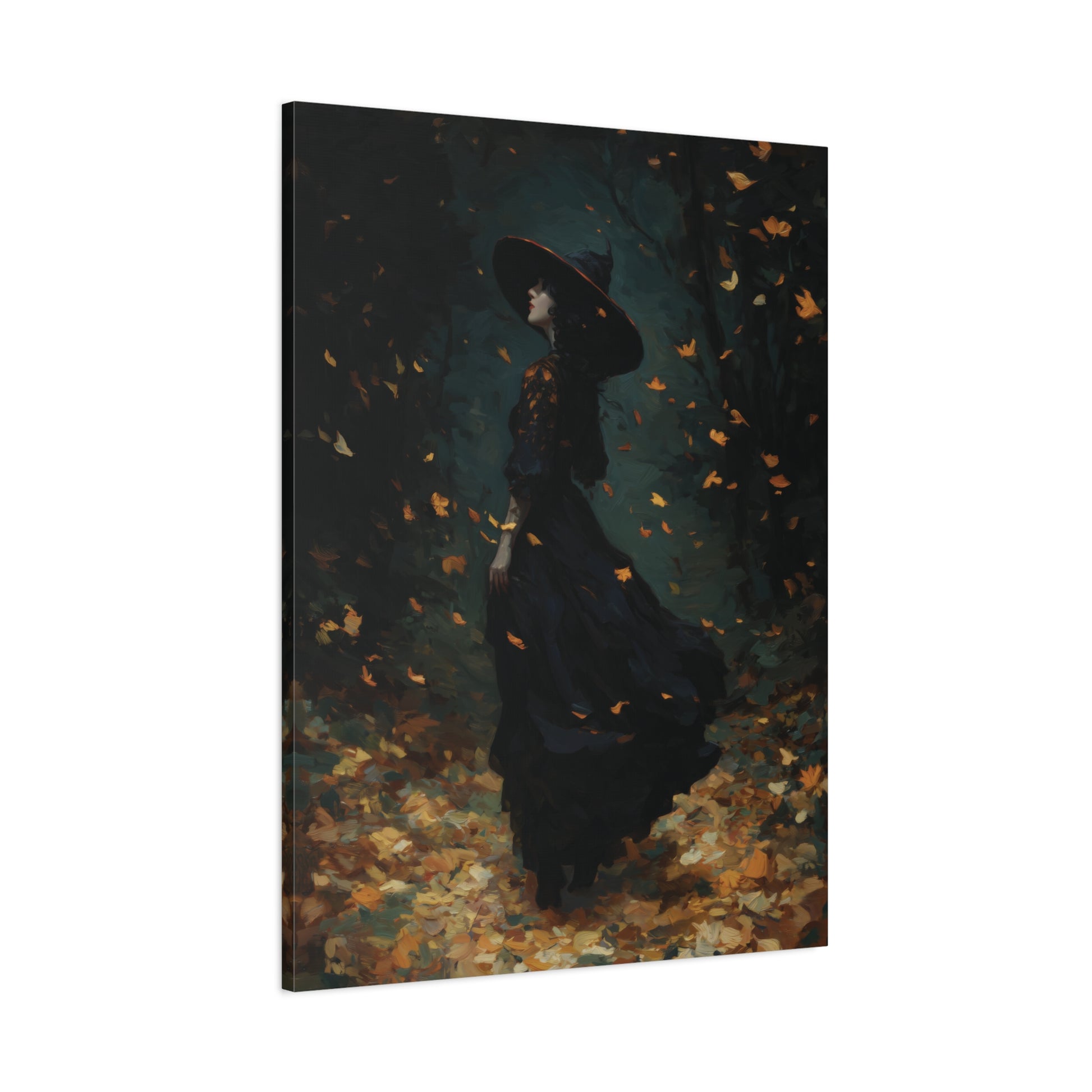 A vertical canvas wall art print depicting a woman in a long black dress and wide-brimmed hat standing in a dark forest with falling orange leaves. The canvas is shown at a slight angle against a plain white background.