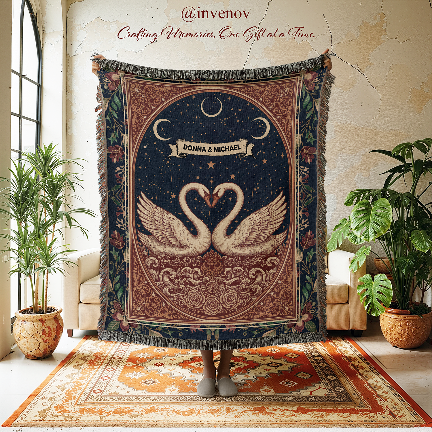 Decorative tapestry with swans and personalized text in a room with plants and furniture.