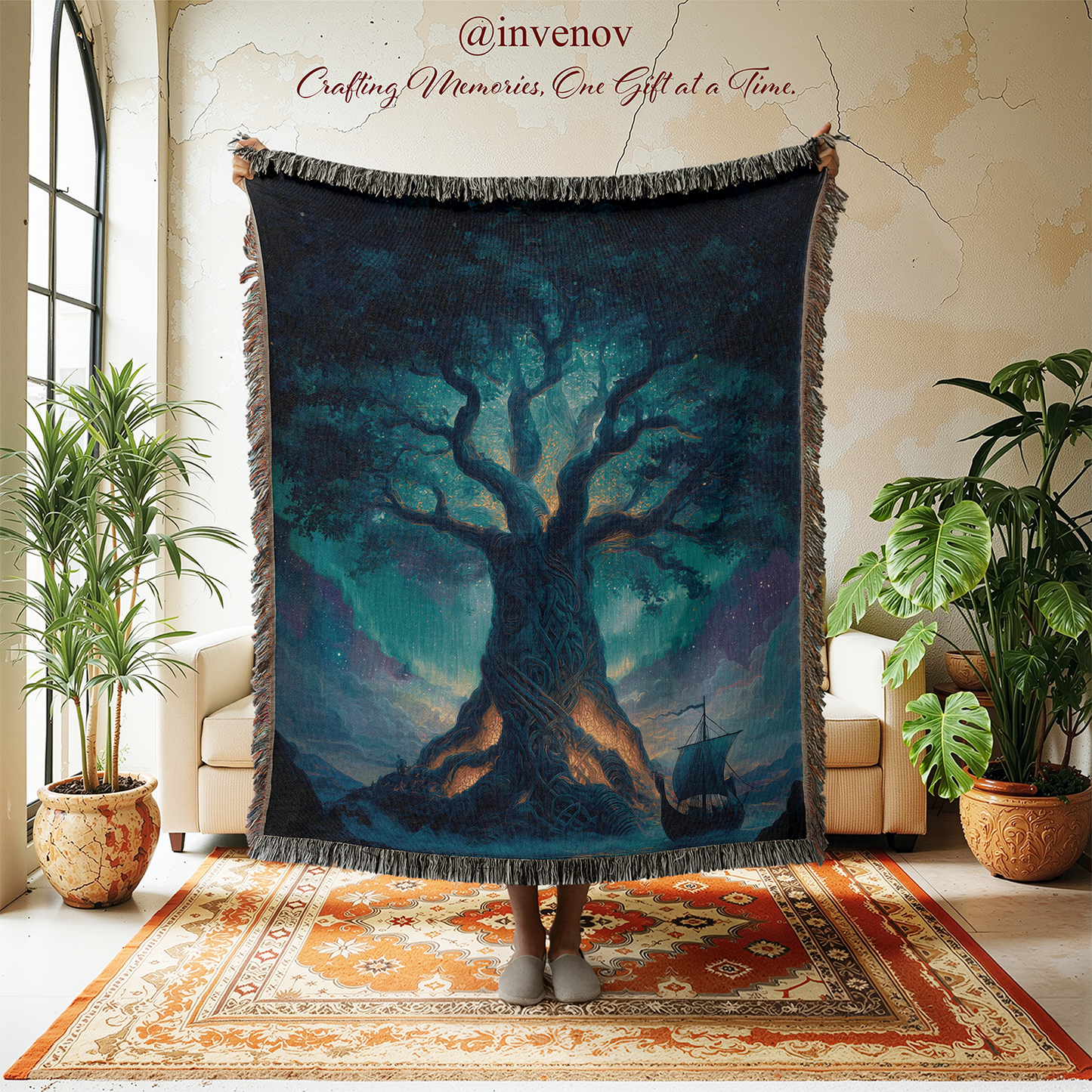 Person holding a large tapestry with a tree design in a room with plants and a couch.