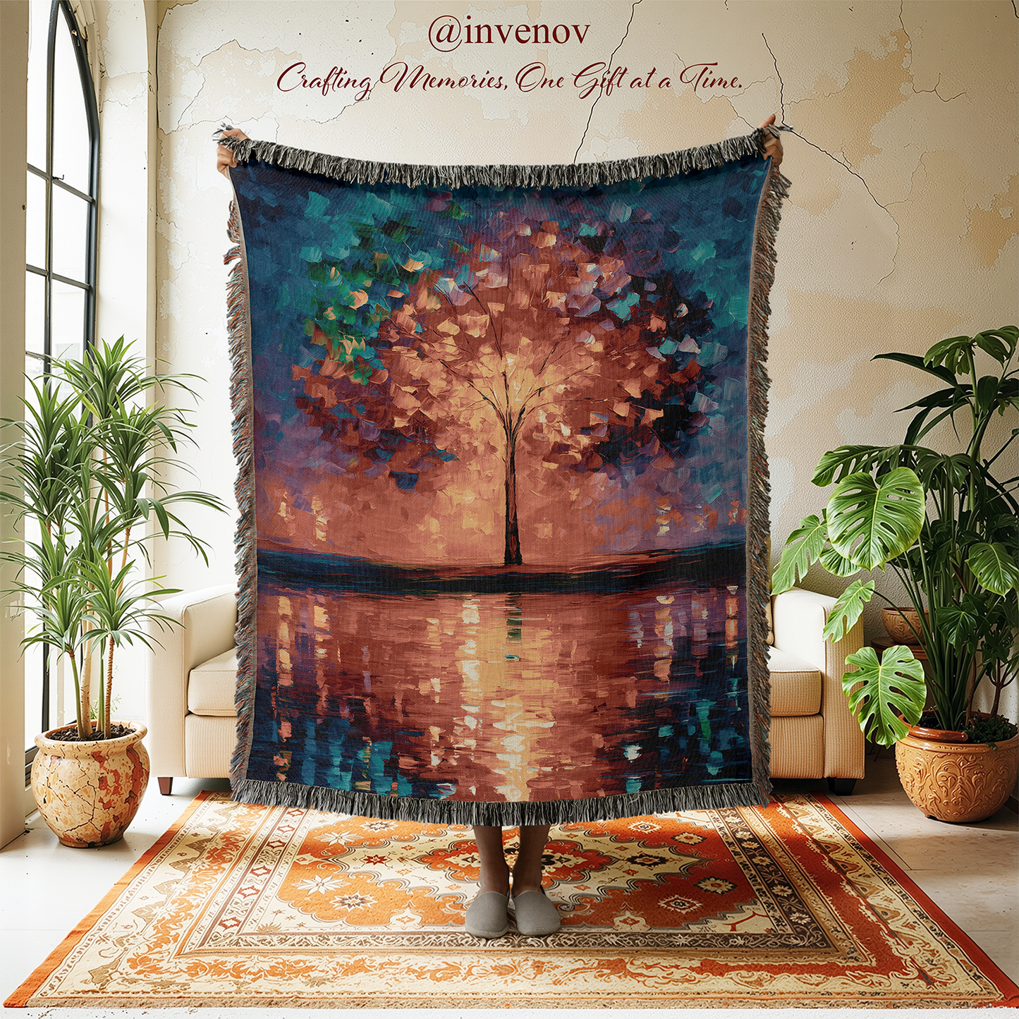 Decorative blanket with tree design in a room with plants and furniture.