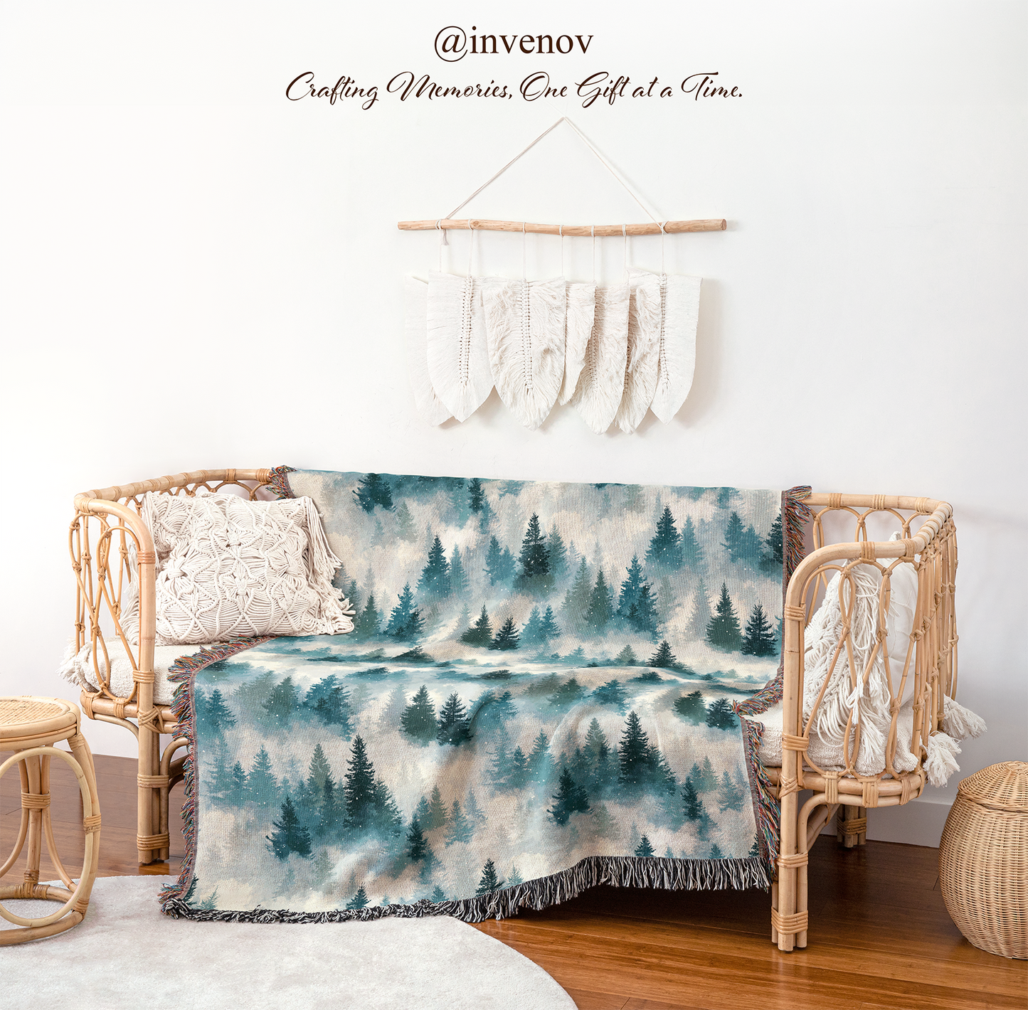 Forest-themed blanket draped over a wicker chair